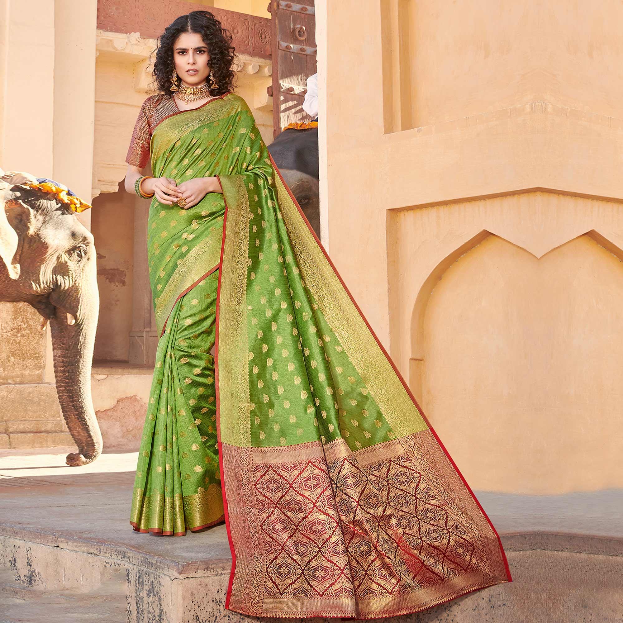 Trendy Green Colored Festive Wear Woven Handloom Silk Saree - Peachmode