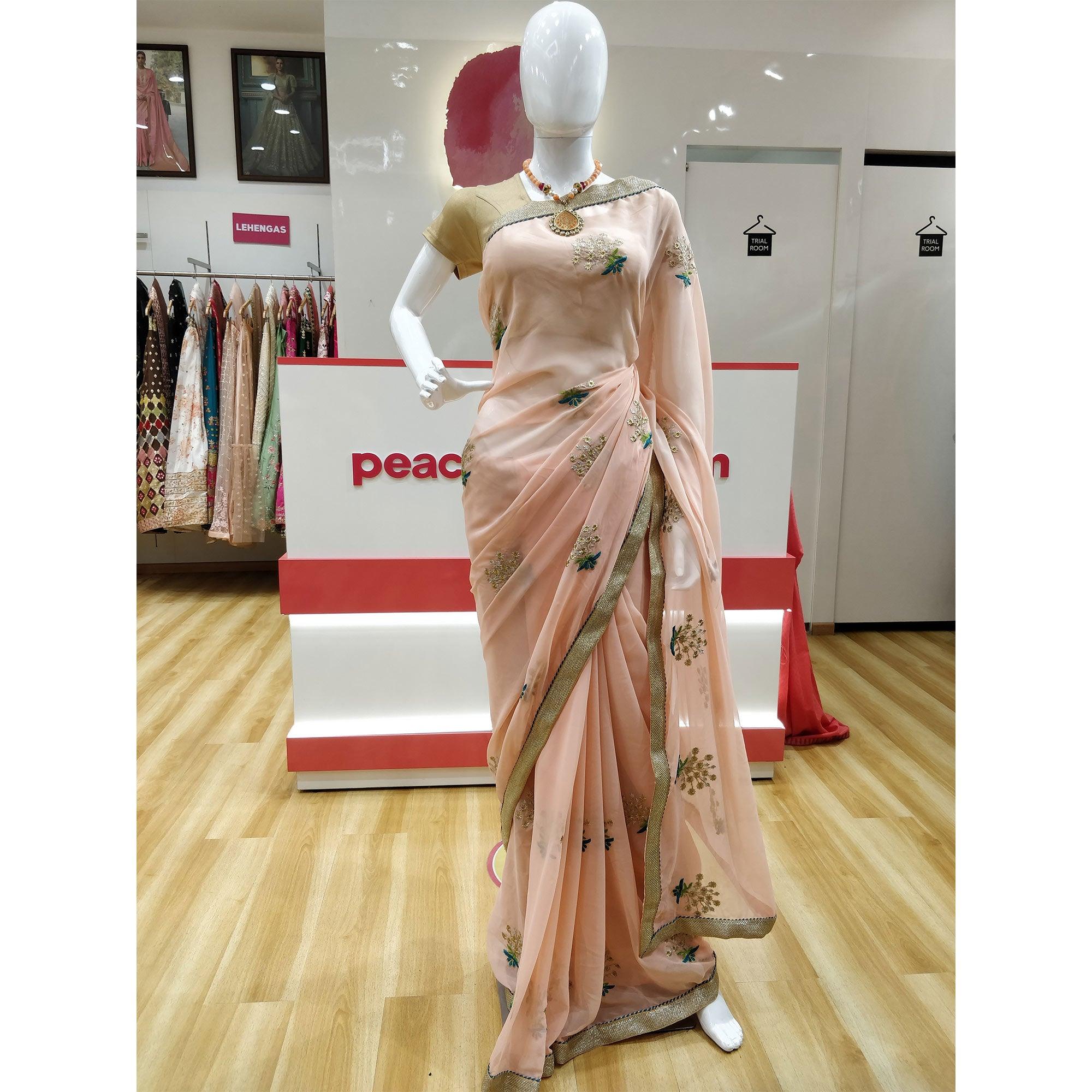 Trendy Peach Colored Partywear Embroidered Faux Georgette Saree - Peachmode