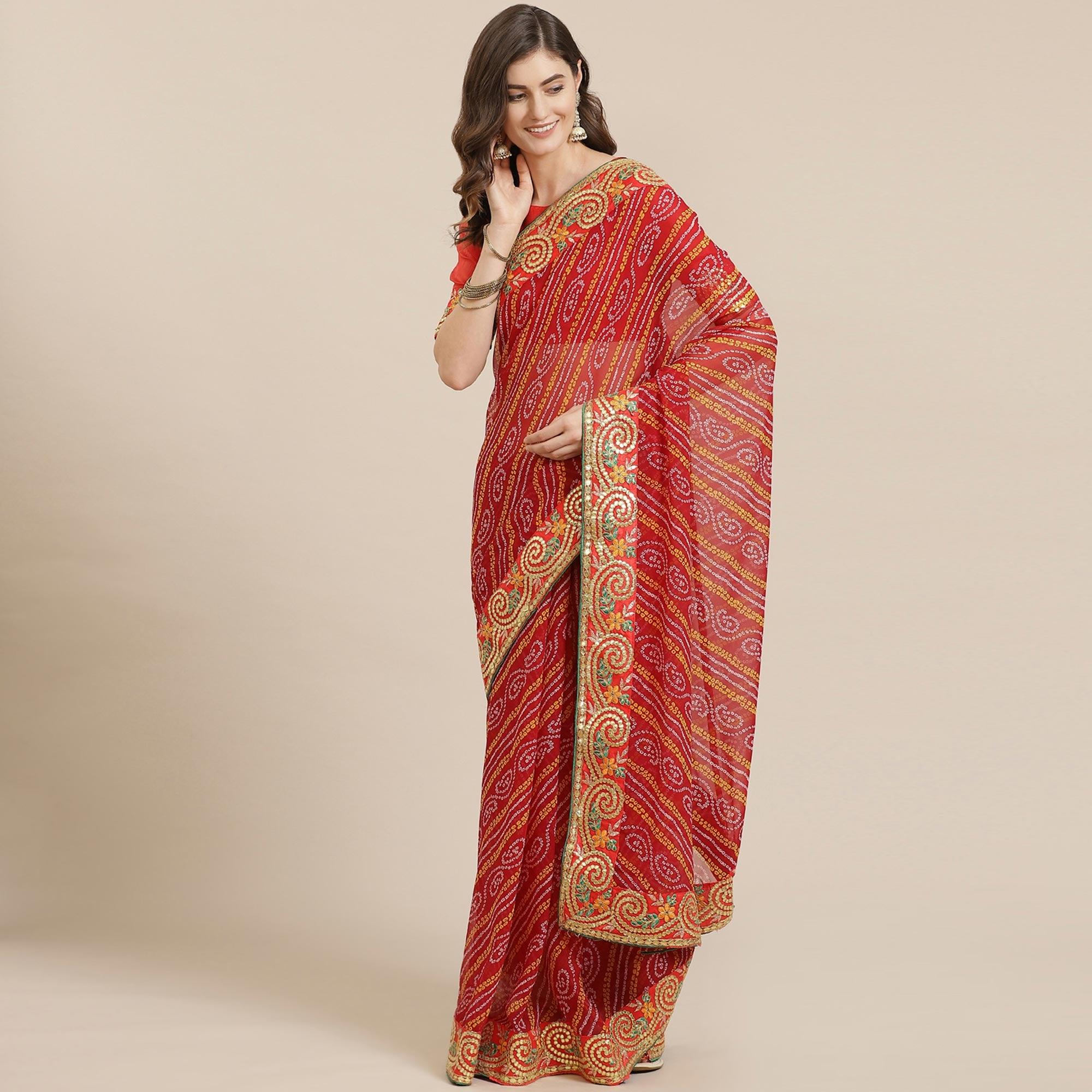 Trendy Red Coloured Partywear Printed Georgette Saree - Peachmode