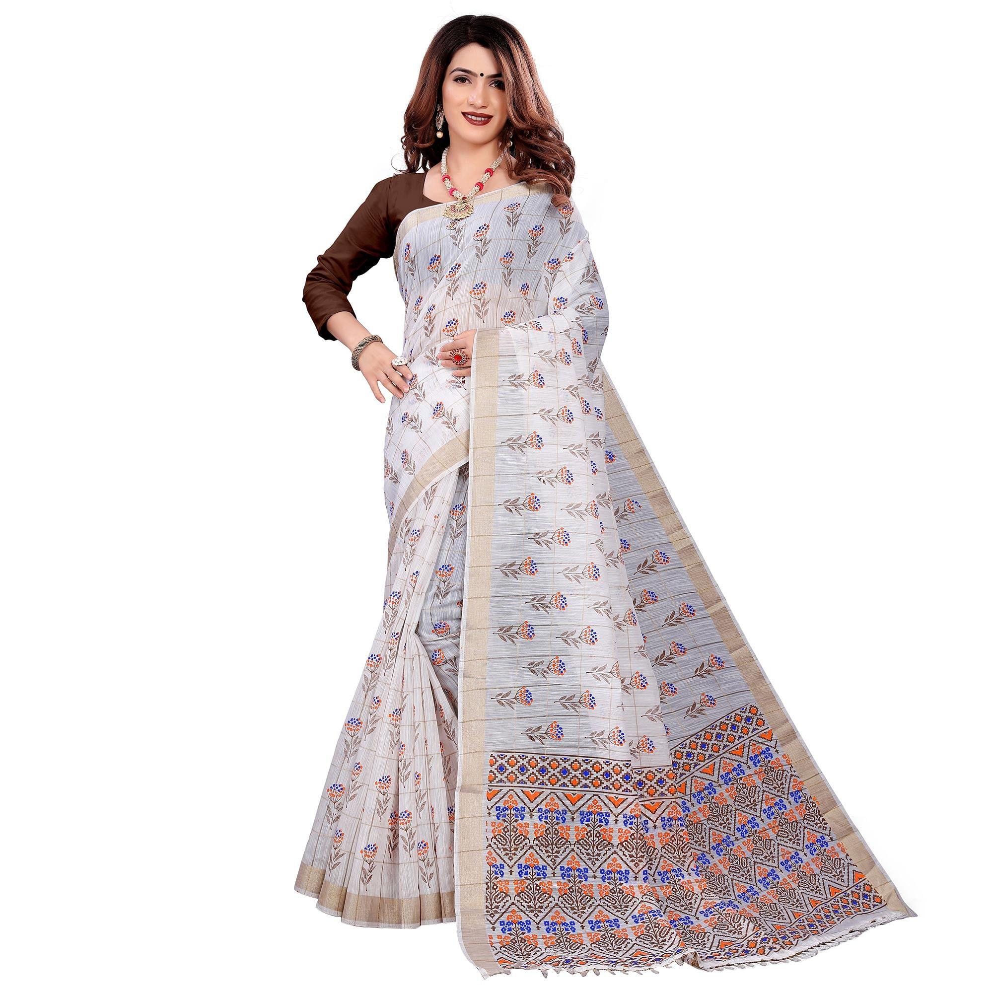 Trendy White Colored Casual Wear Printed Cotton Saree With Tassels - Peachmode