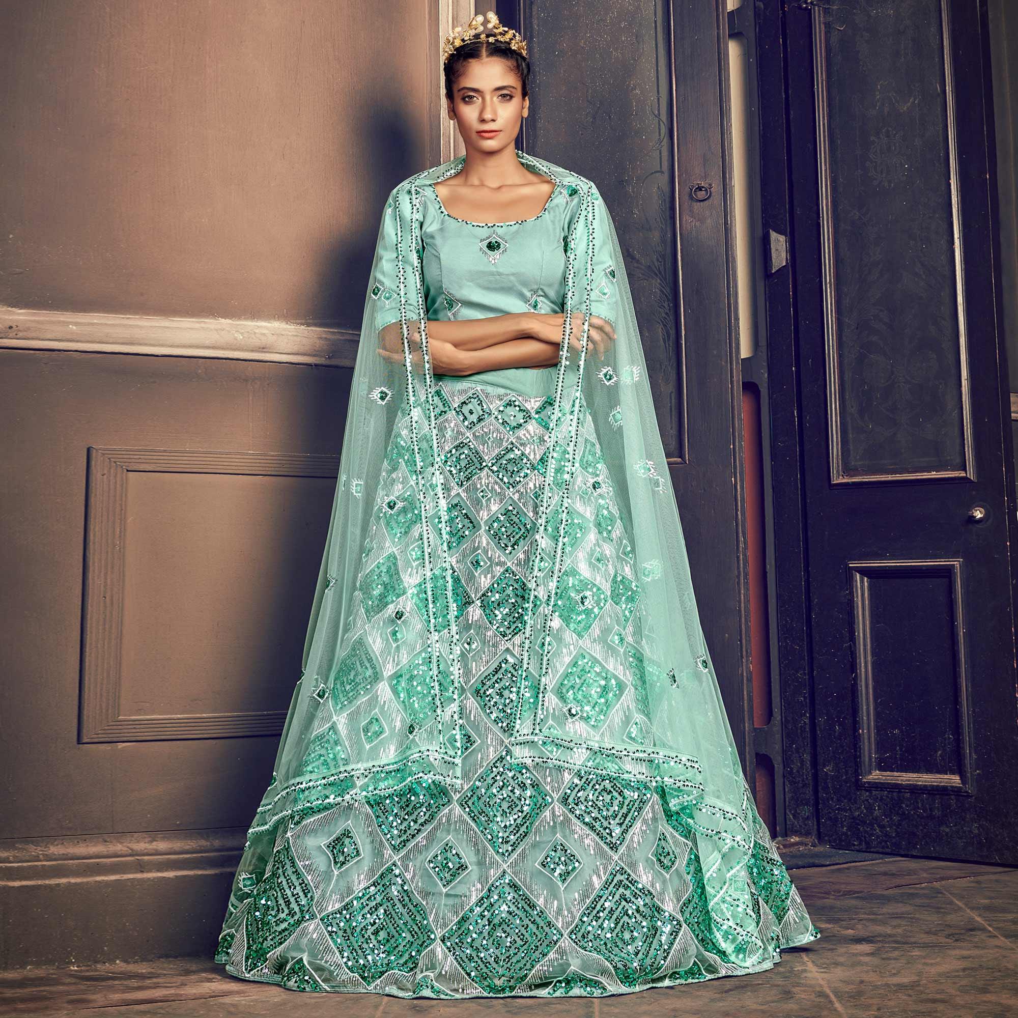 Turquoise Blue Partywear Sequence Embroidered Net Lehenga Choli - Peachmode