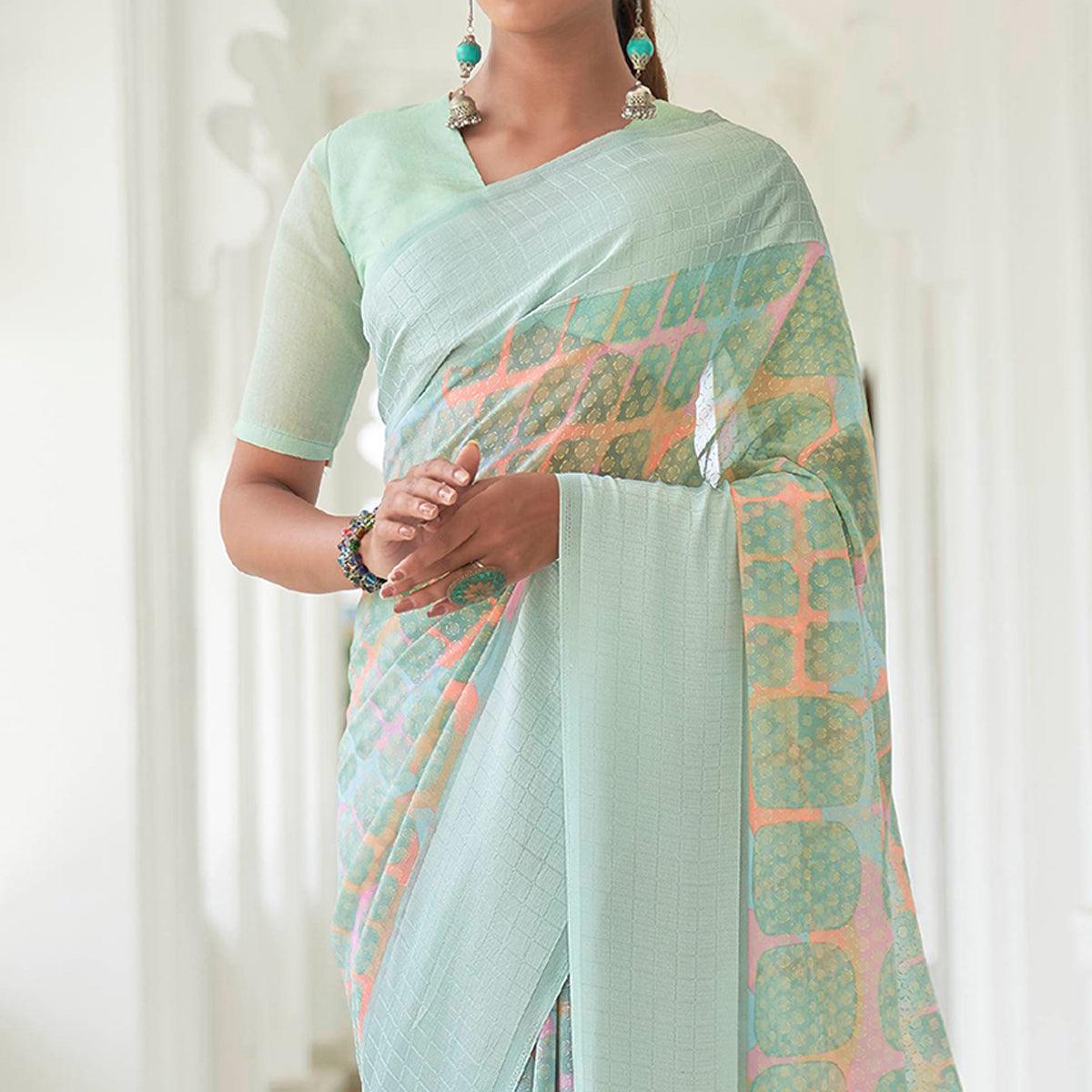 Turquoise Casual Wear Foil Printed Georgette Saree With Jacquard Border - Peachmode