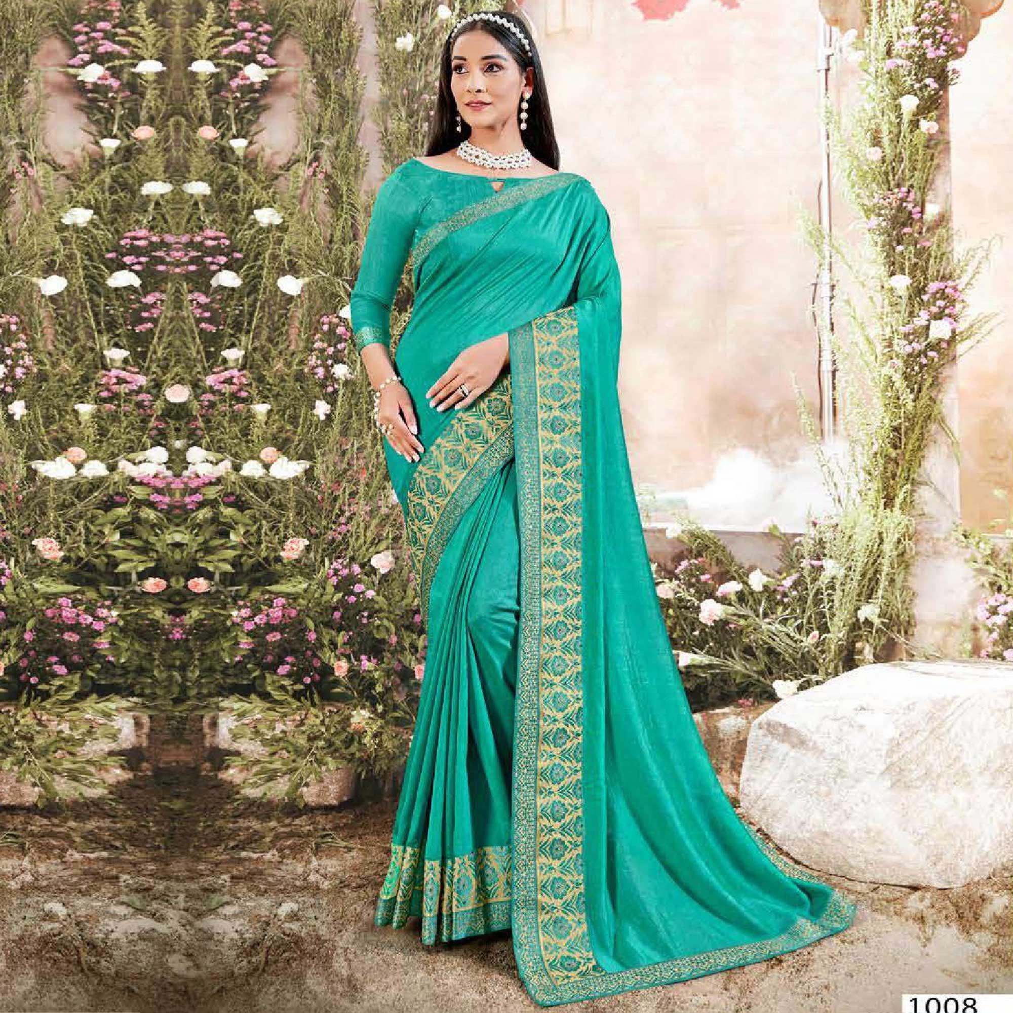 Turquoise Casual Wear Solid Silk Saree With Fancy Border - Peachmode
