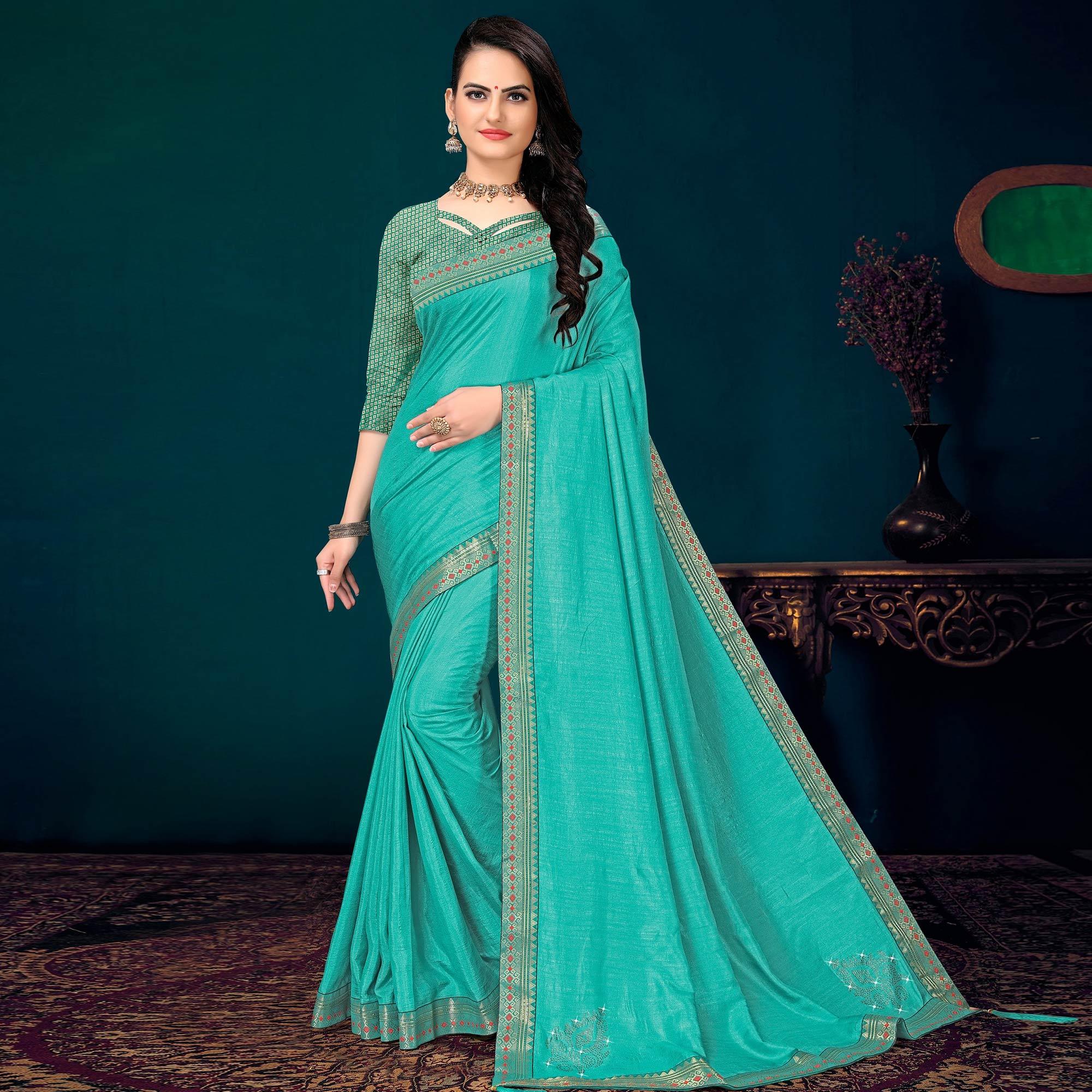 Turquoise Embellished Vichitra Silk Saree - Peachmode