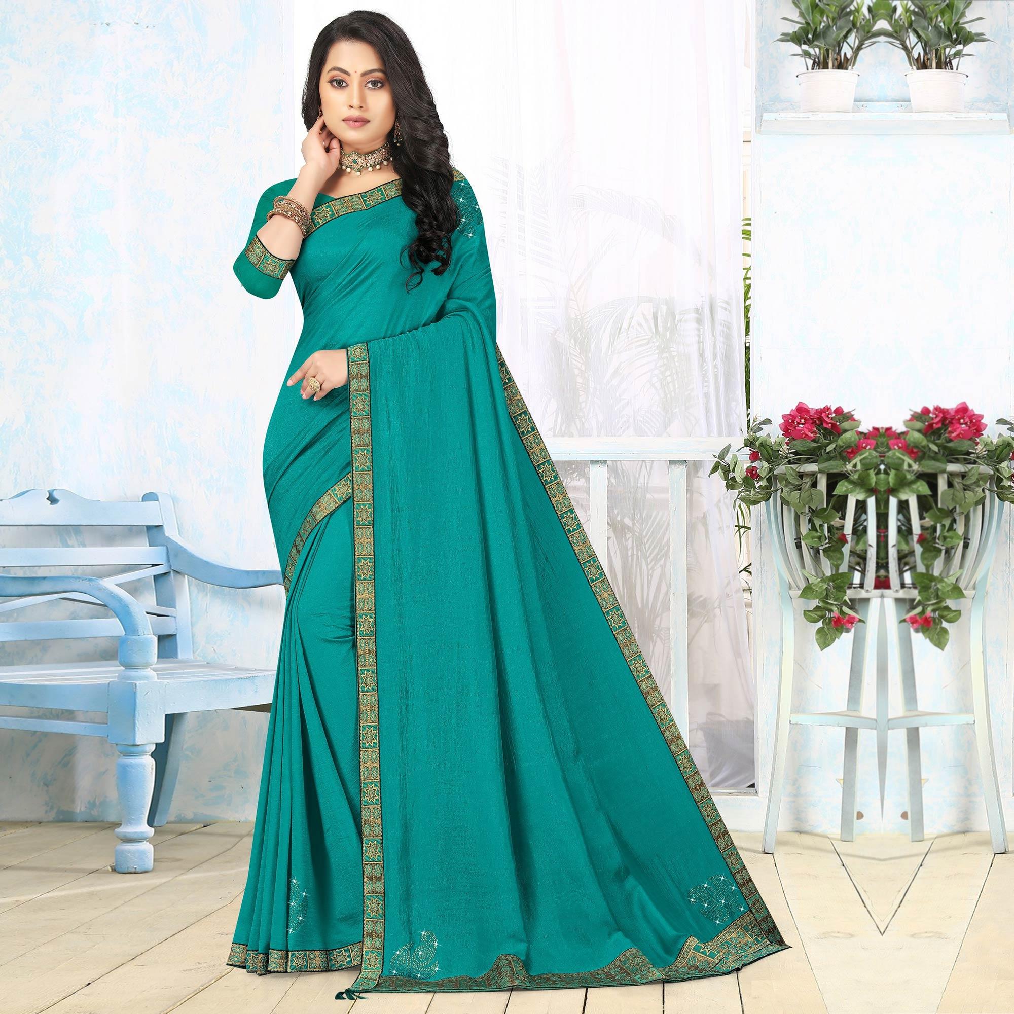 Turquoise Embellished Vichitra Silk Saree - Peachmode