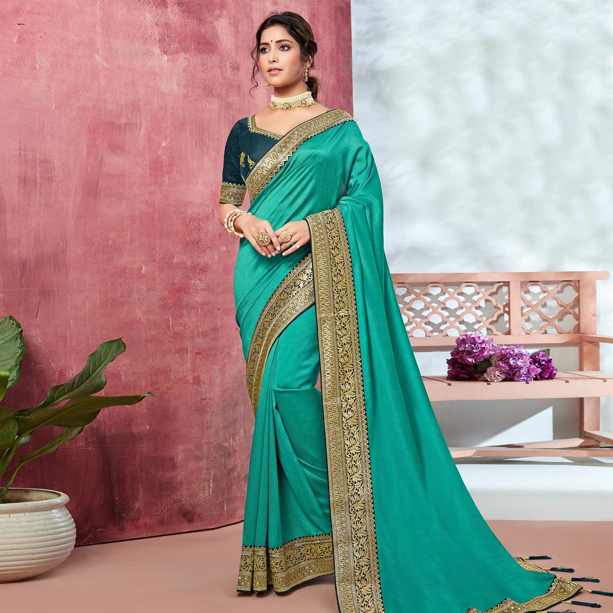Turquoise Festive Wear Silk Saree With Embroidered Border - Peachmode