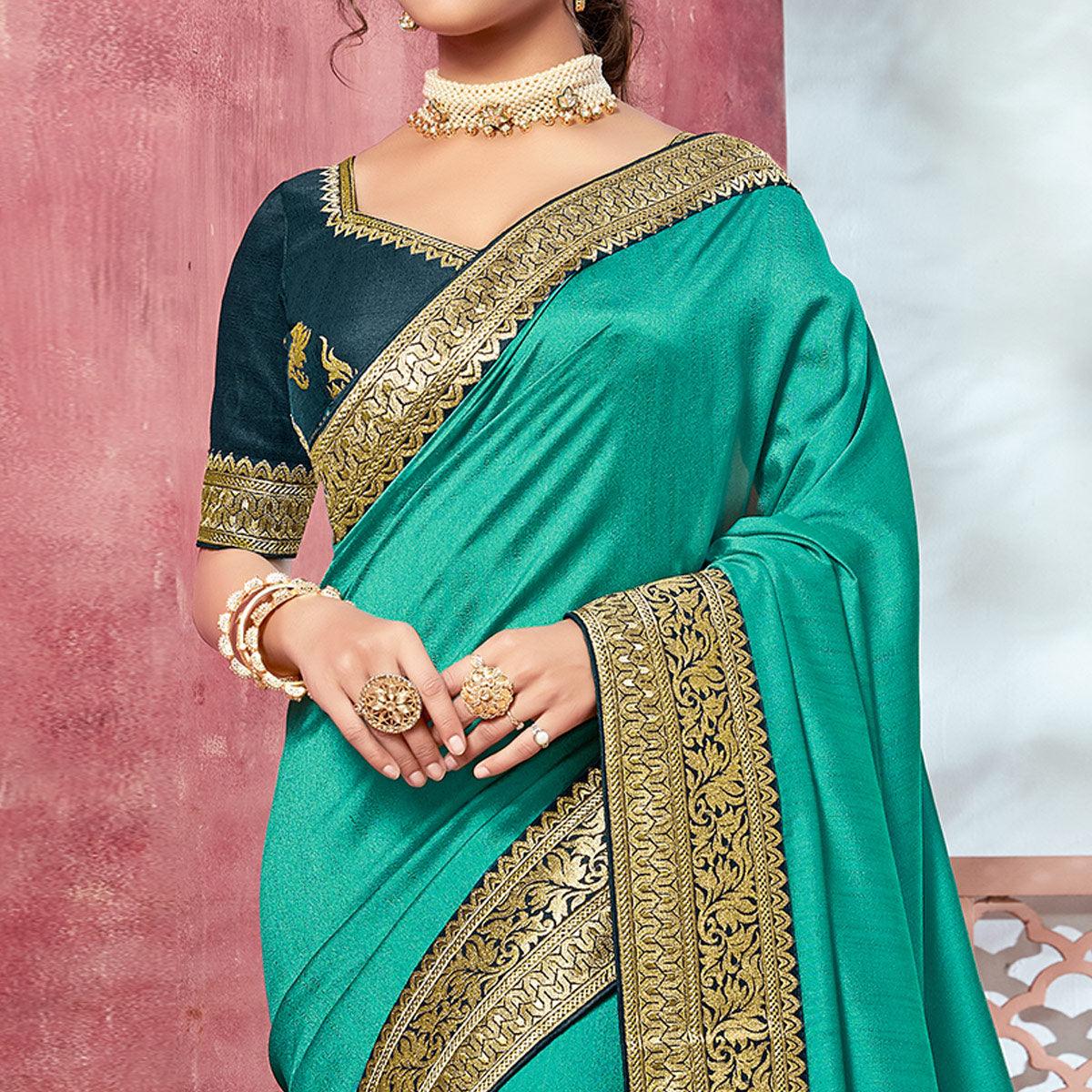 Turquoise Festive Wear Silk Saree With Embroidered Border - Peachmode