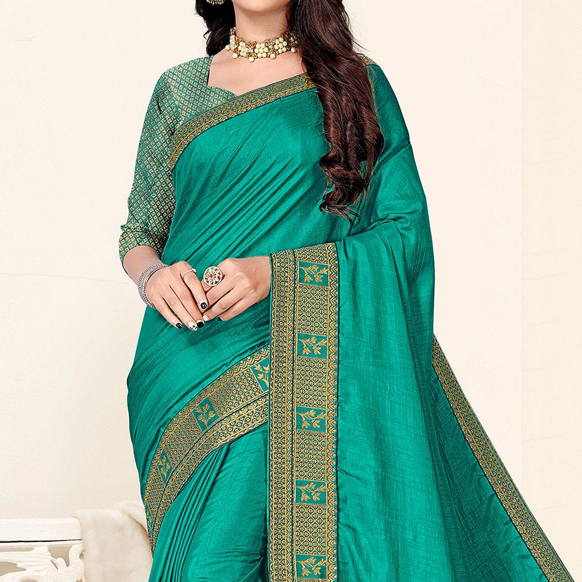 Turquoise Festive Wear Solid Art Silk Saree - Peachmode