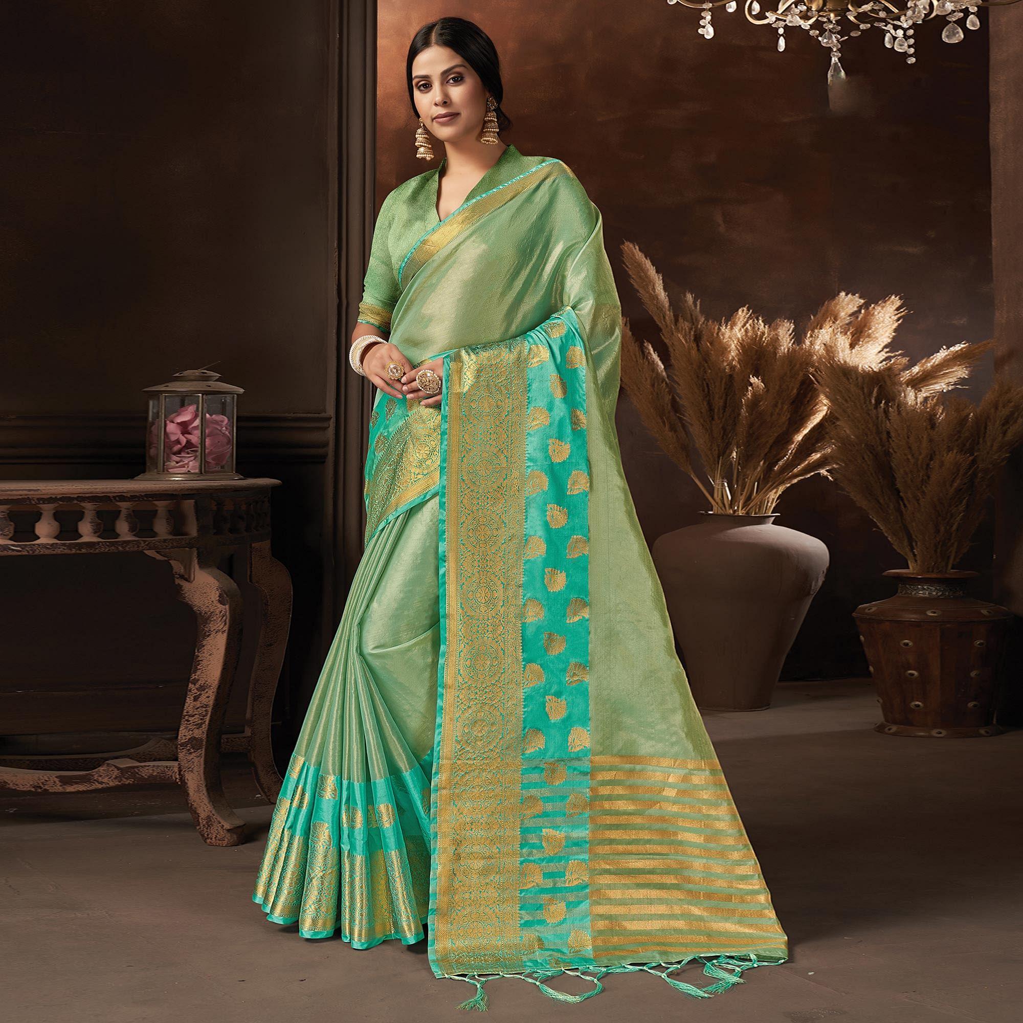 Turquoise Festive Wear Solid Organza Saree With Tassels - Peachmode