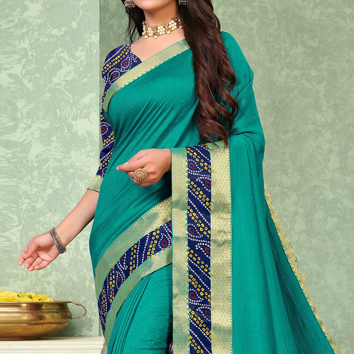 Turquoise Festive Wear Solid Vichitra Silk Saree - Peachmode