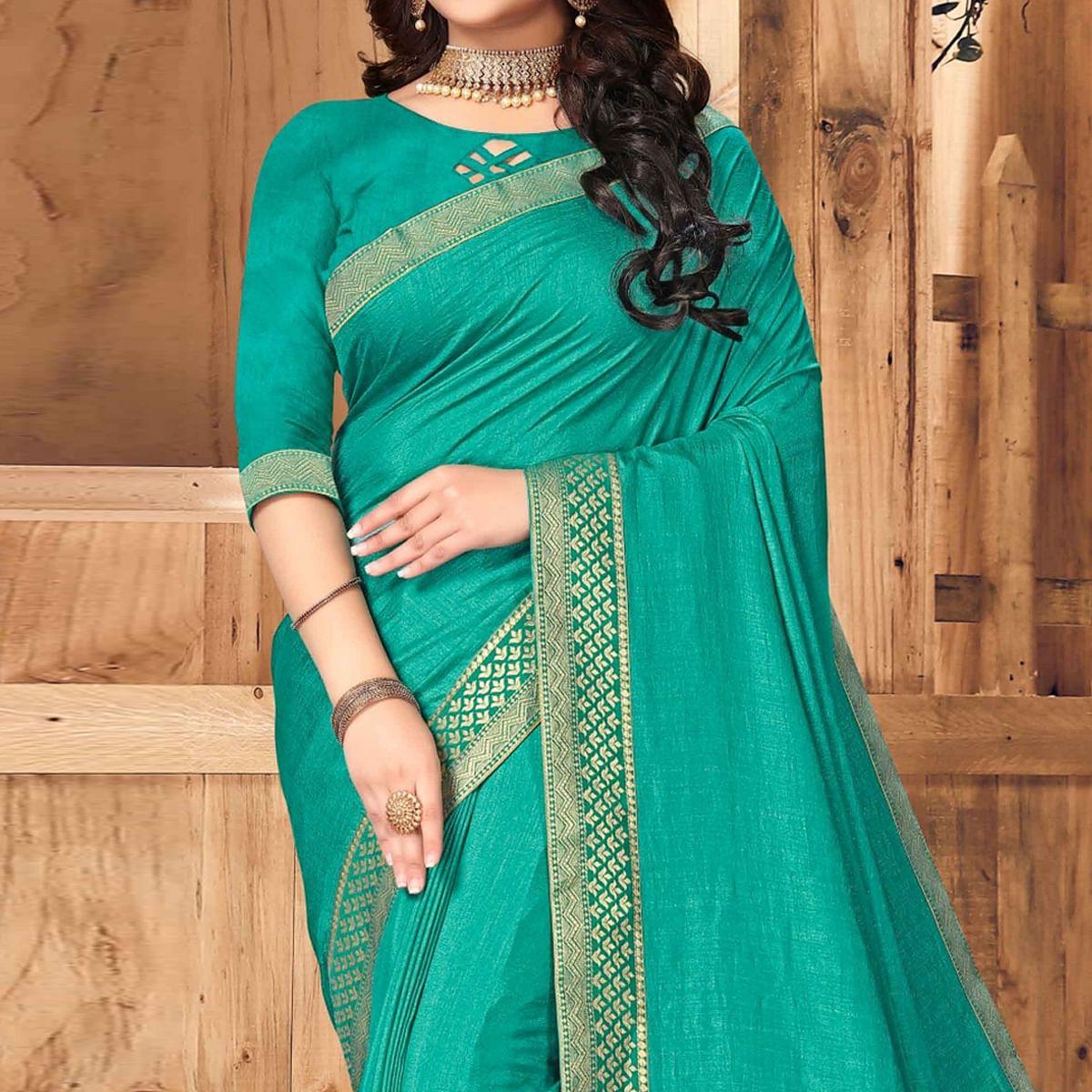 Turquoise Festive Wear Solid Vichitra Silk Saree - Peachmode