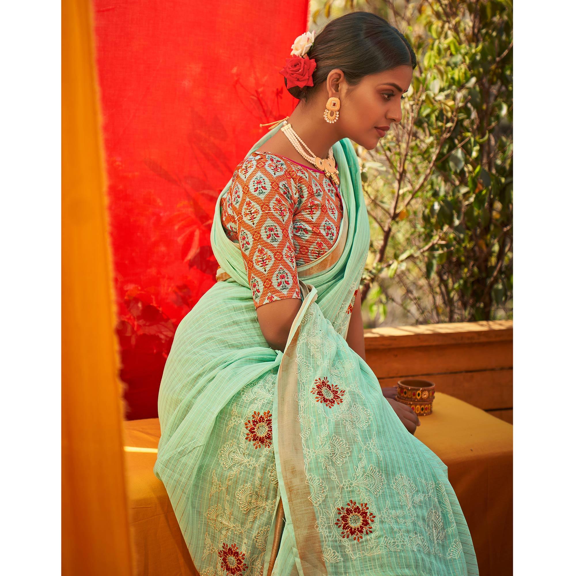 Turquoise Floral Embroidered Linen Saree - Peachmode
