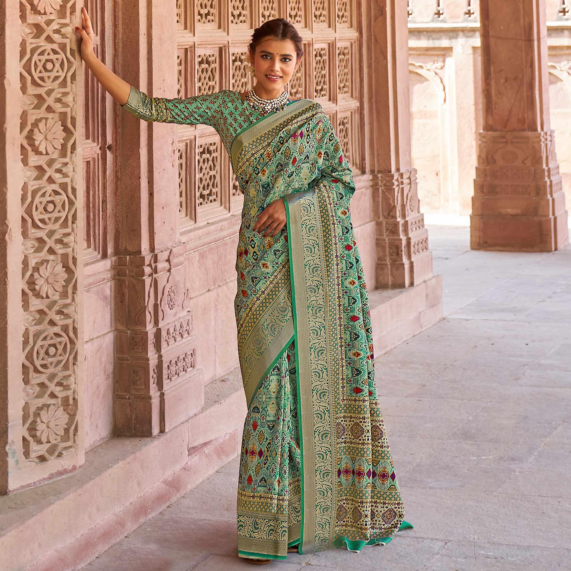Turquoise Green Festive Wear Digital Printed Soft Silk Saree With Viscose Zari Border - Peachmode