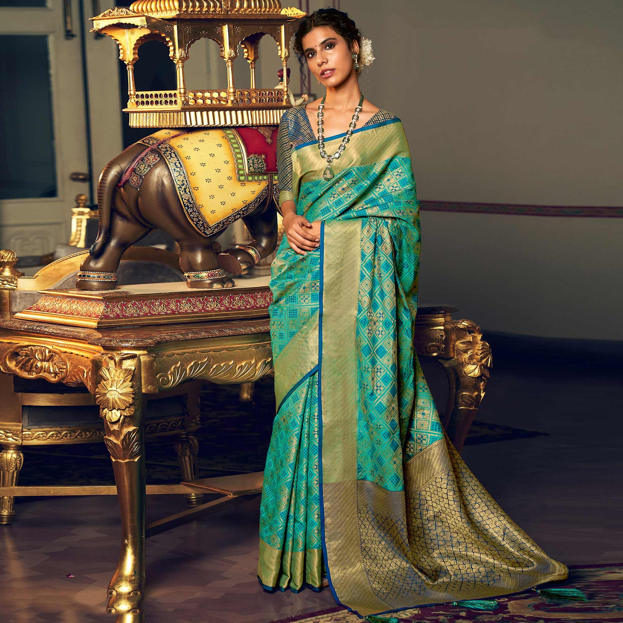 Turquoise Green Festive Wear Woven Patola Silk Saree - Peachmode