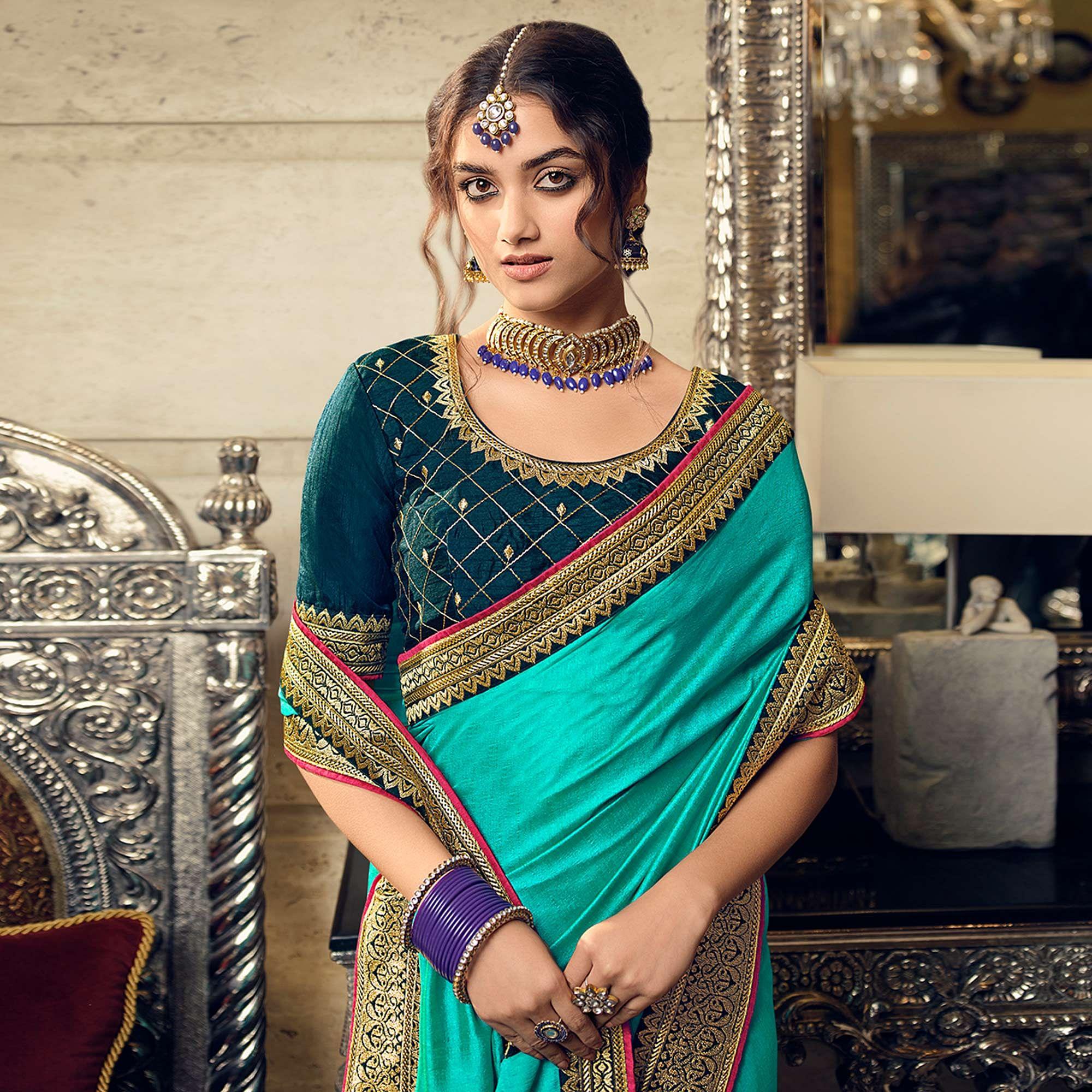 Turquoise Partywear Embroidered Silk Saree - Peachmode