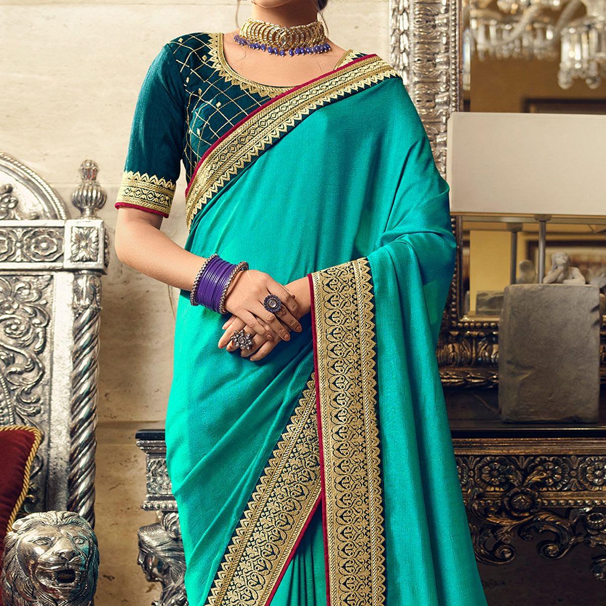 Turquoise Partywear Embroidered Silk Saree - Peachmode