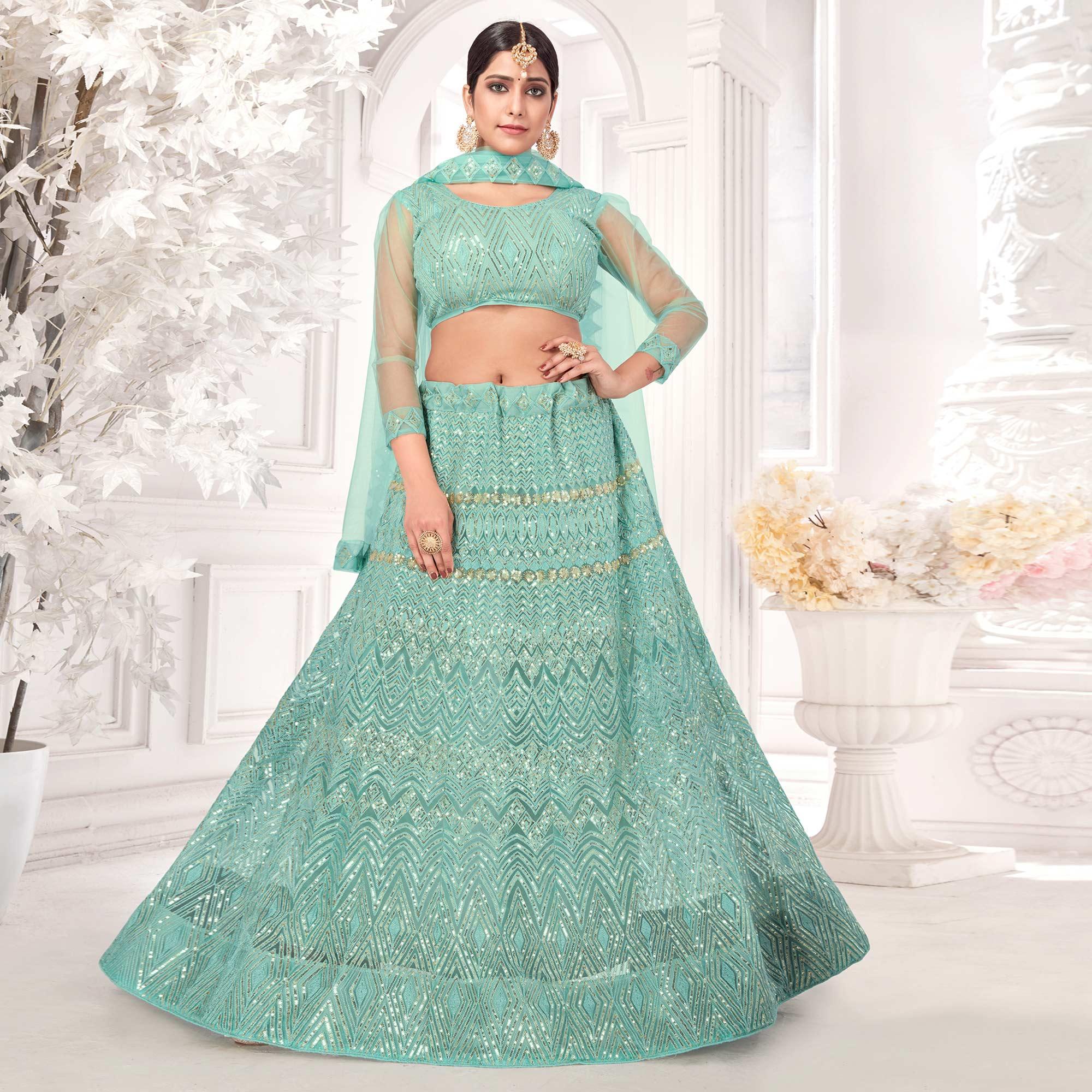 Turquoise Partywear Sequence Embroidered Net Lehenga Choli - Peachmode