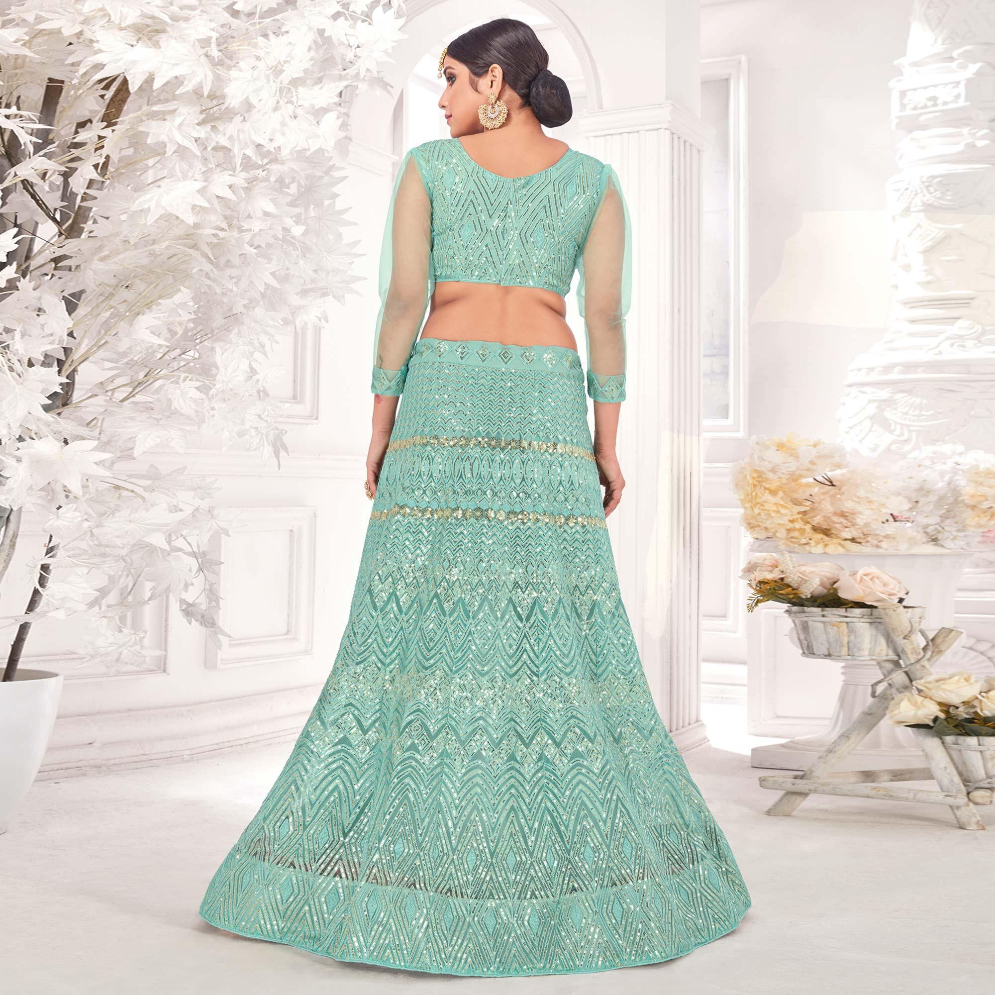 Turquoise Partywear Sequence Embroidered Net Lehenga Choli - Peachmode