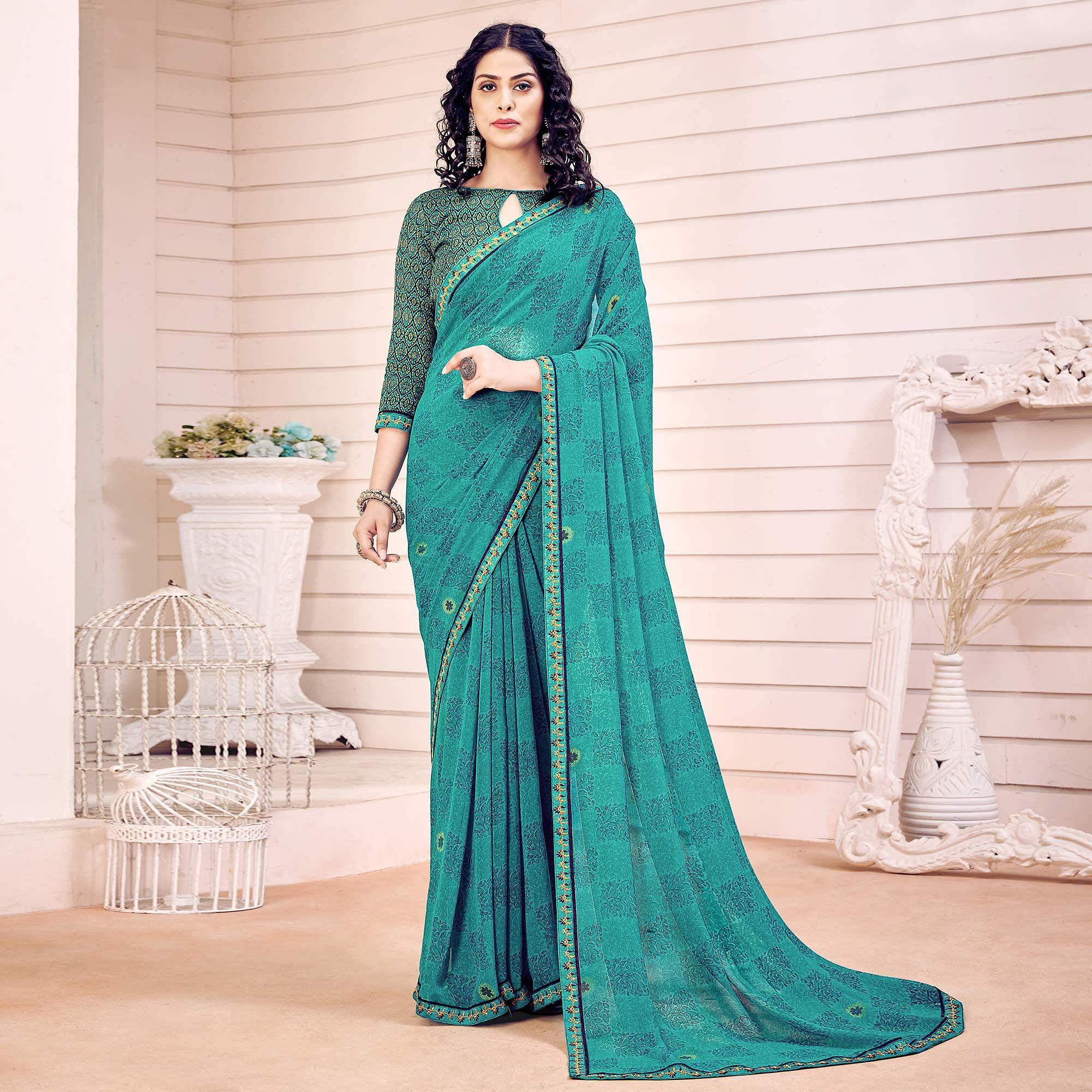 Turquoise Printed Georgette Saree - Peachmode