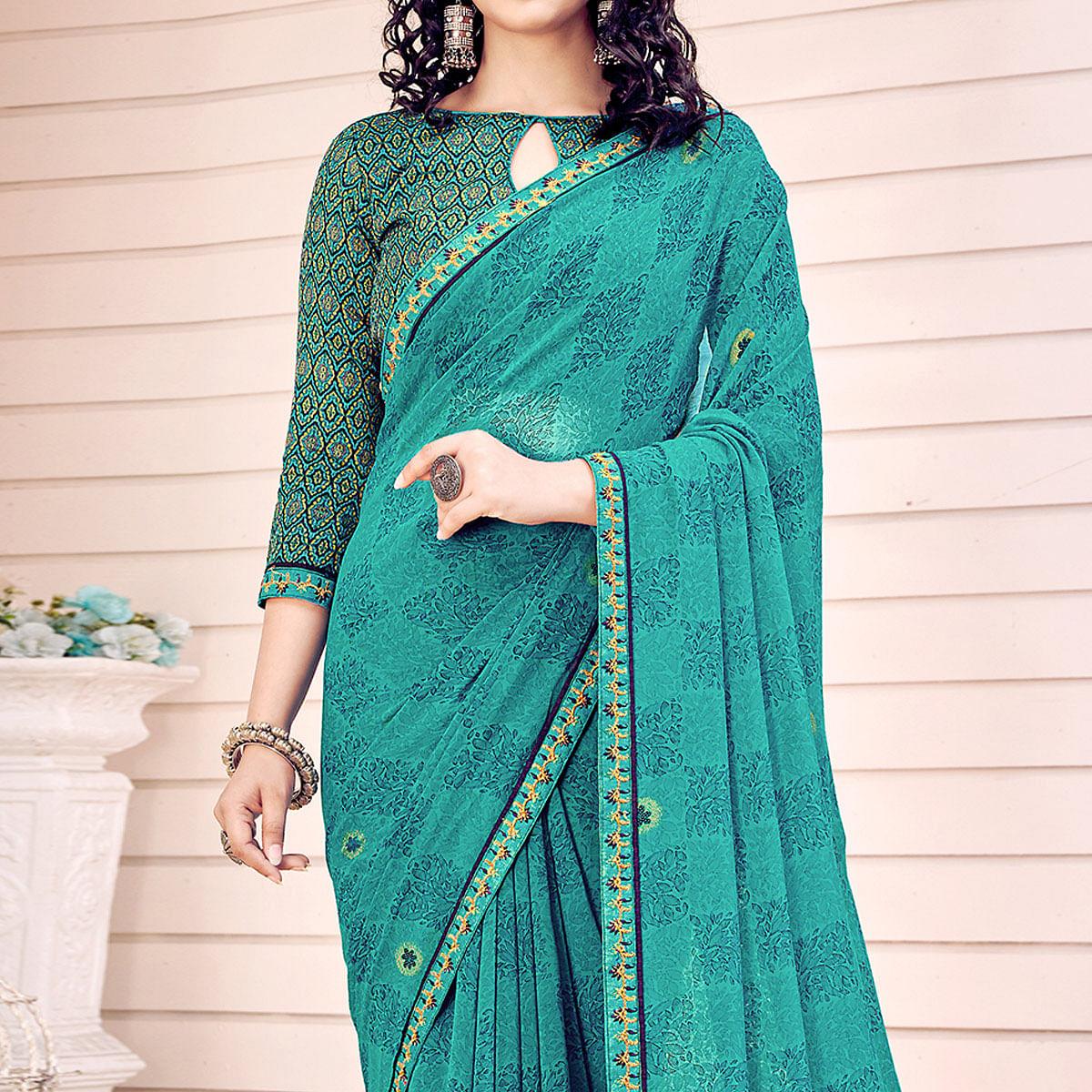 Turquoise Printed Georgette Saree - Peachmode