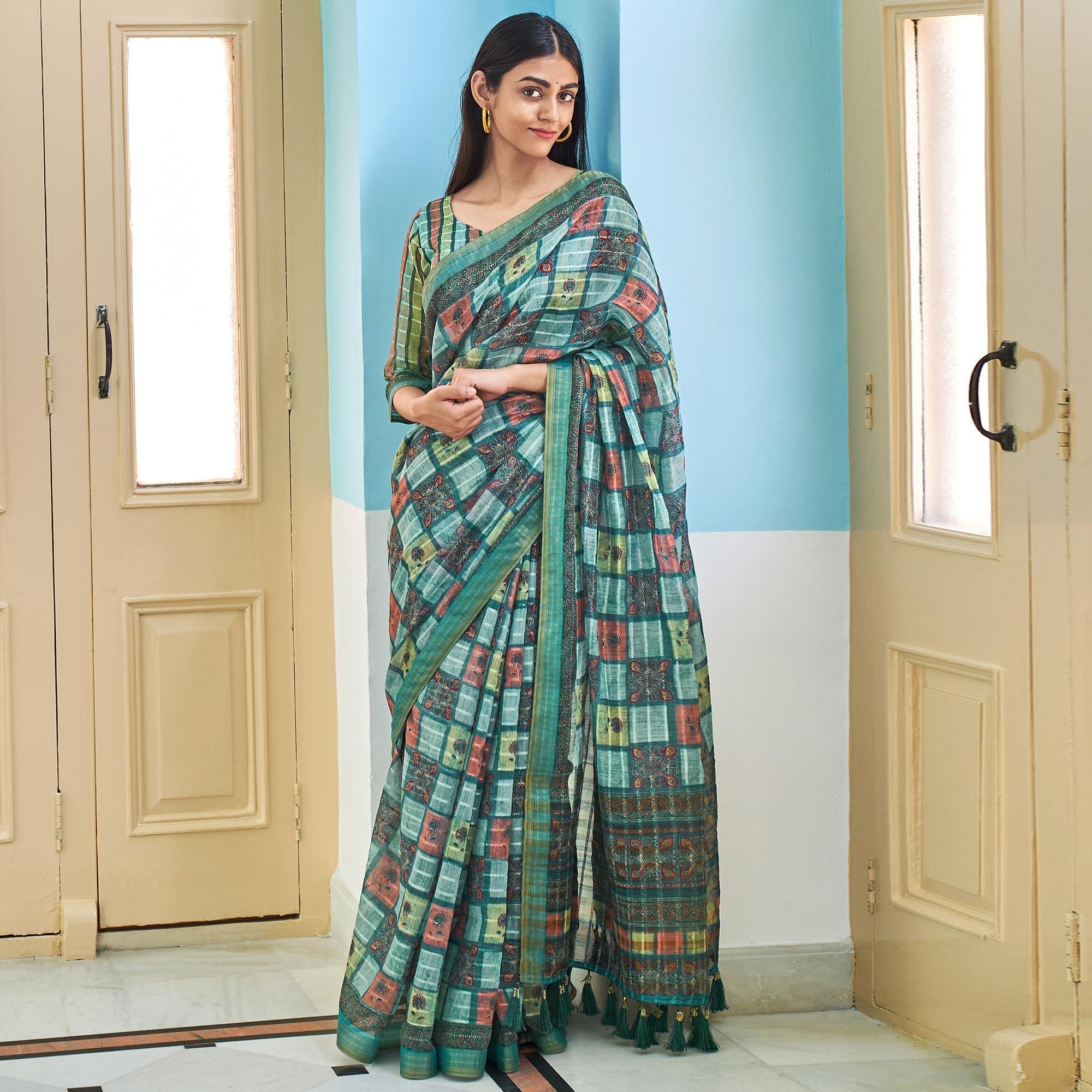 Turquoise Sequence Embroidered Linen Saree - Peachmode