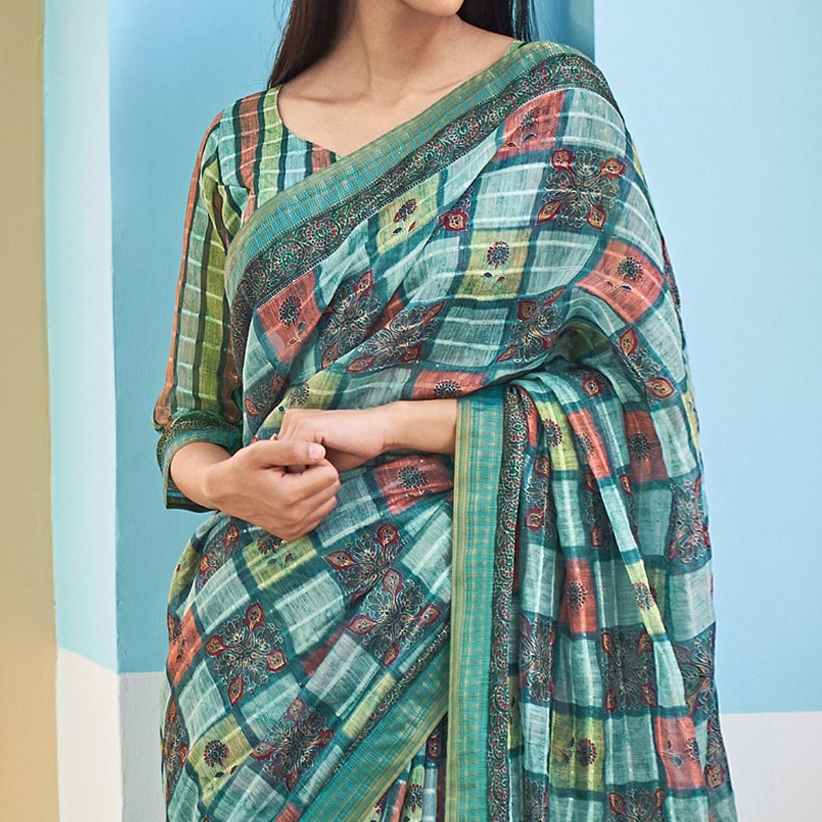 Turquoise Sequence Embroidered Linen Saree - Peachmode