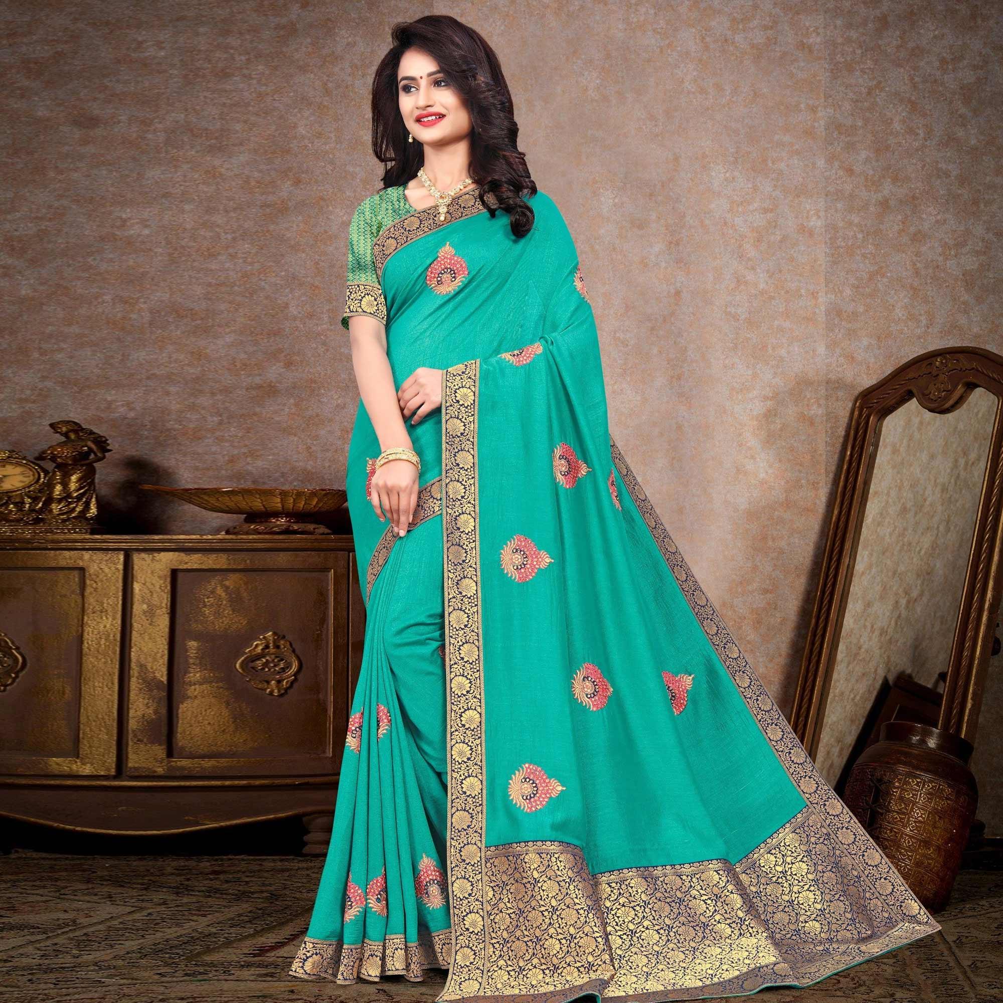 Turquoise Sequence Embroidered Vichitra Silk Saree - Peachmode