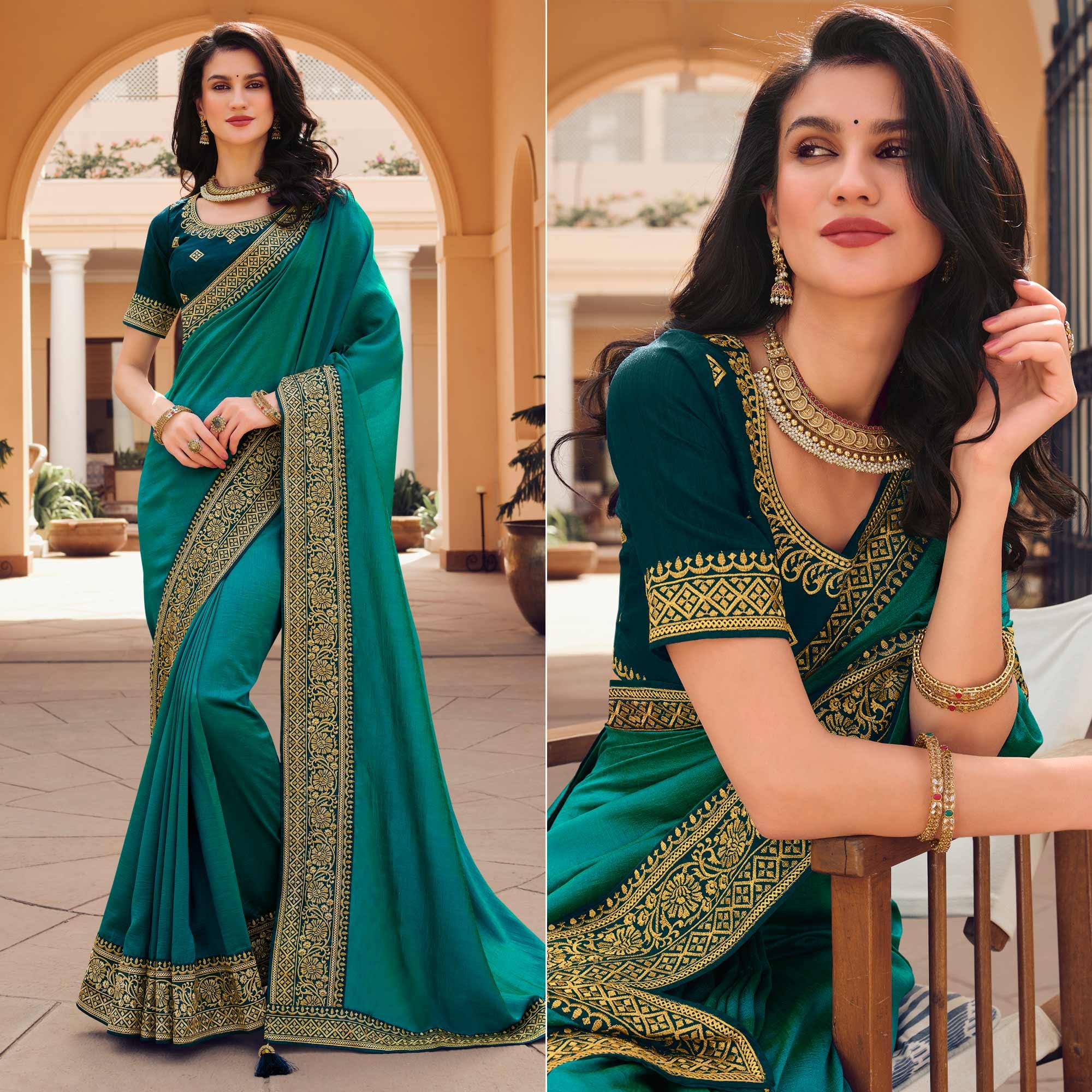 Turquoise Solid Vichitra Silk Saree With Tassels - Peachmode