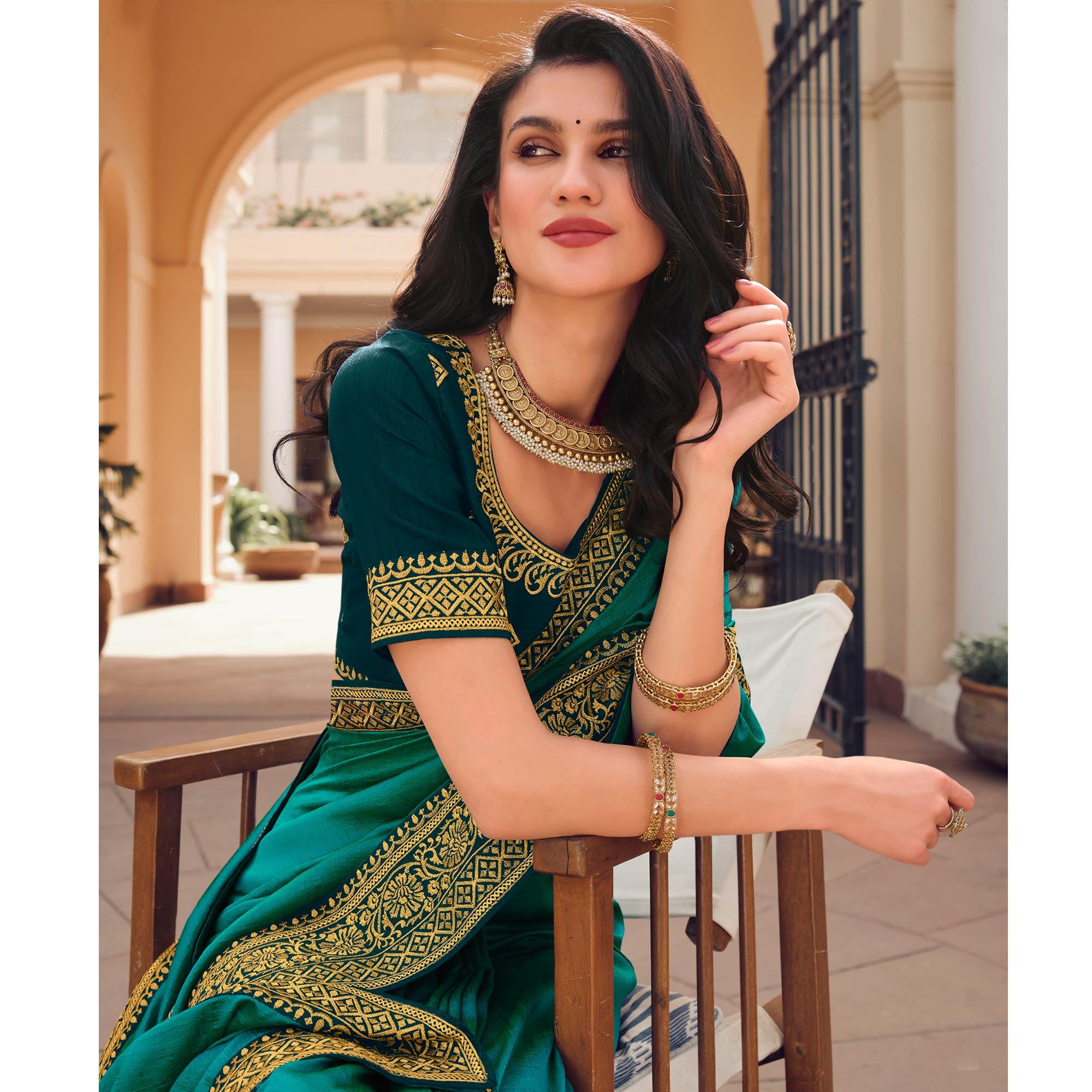 Turquoise Solid Vichitra Silk Saree With Tassels - Peachmode