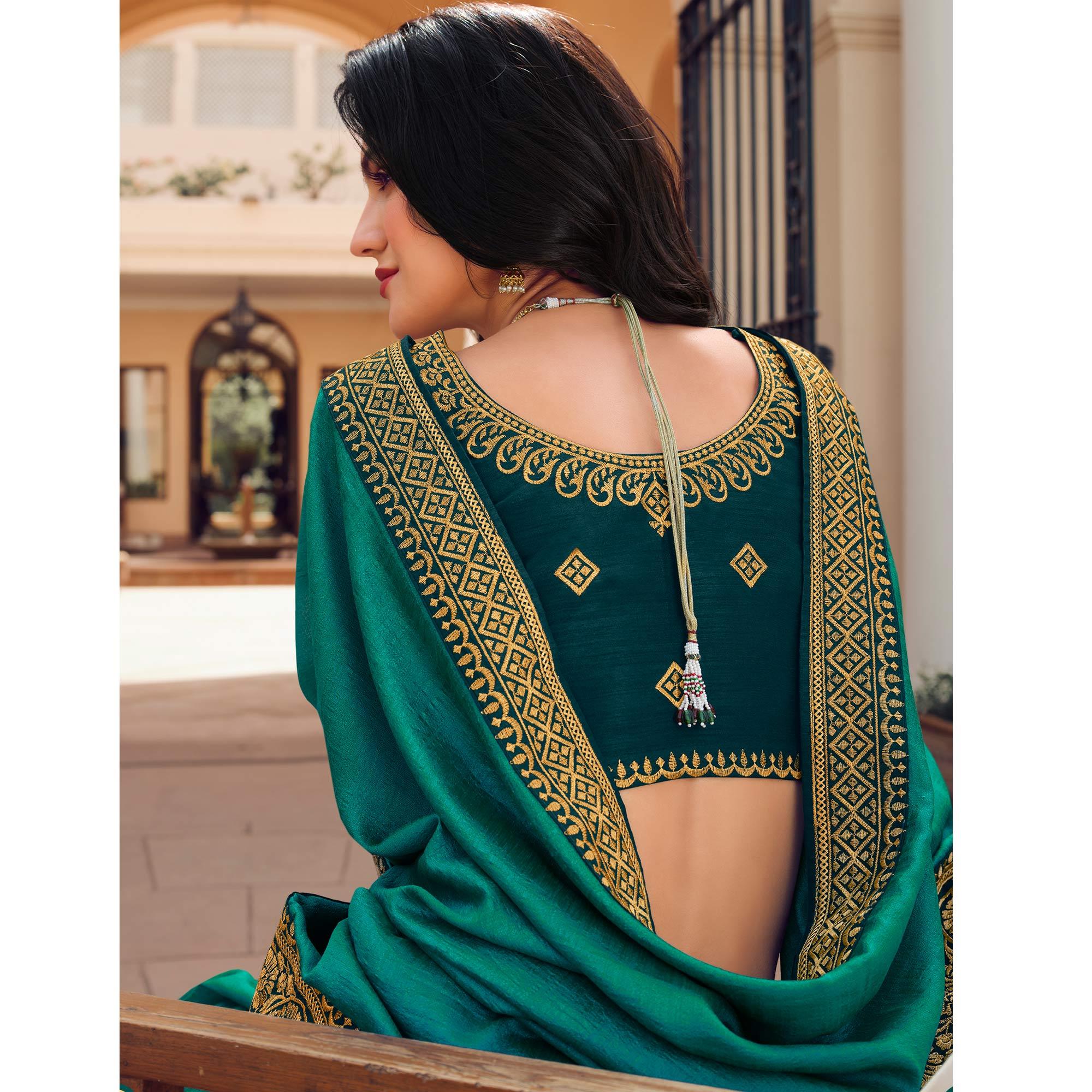 Turquoise Solid Vichitra Silk Saree With Tassels - Peachmode