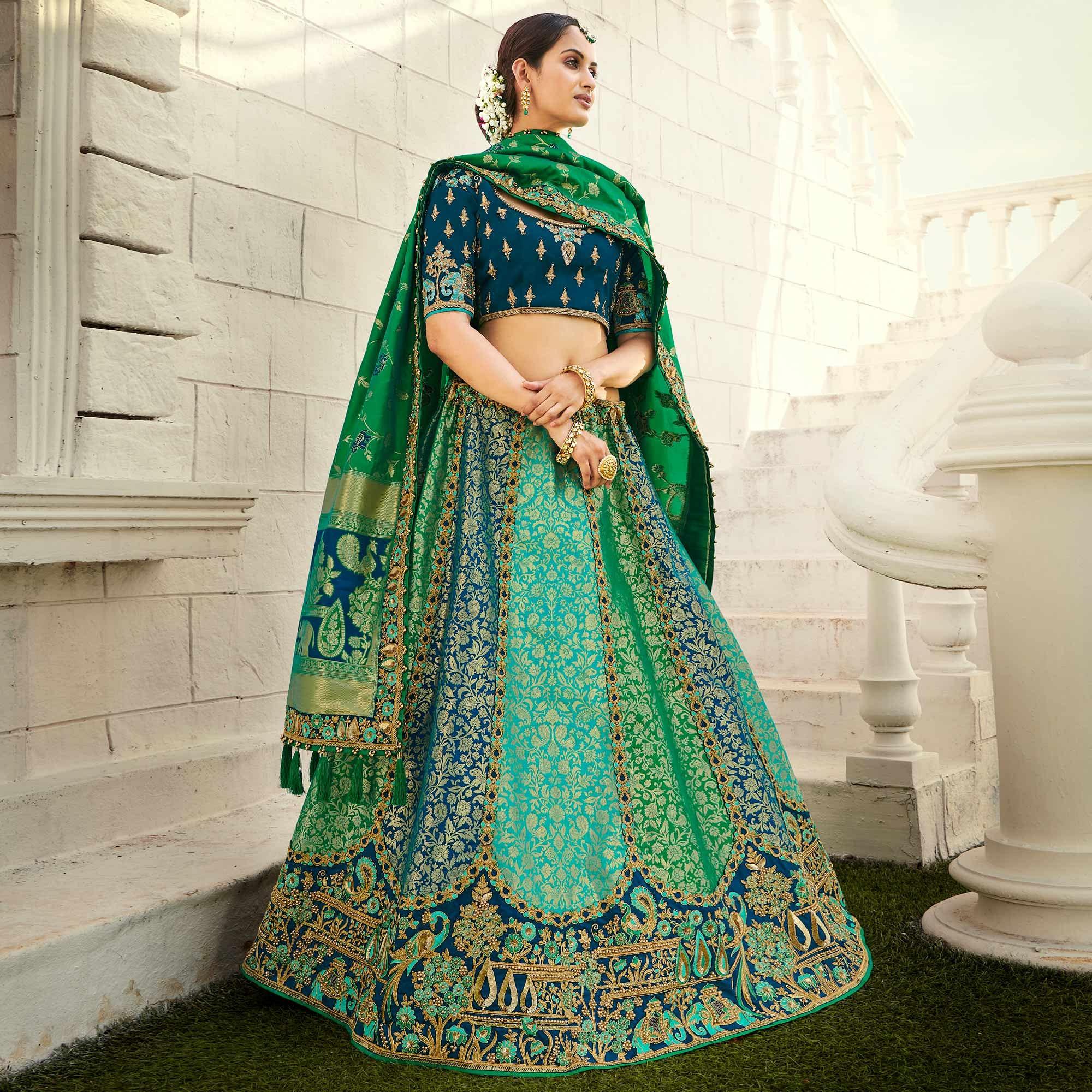 Turquoise Wedding Wear Heavy Embroidered Banarasi Silk Lehenga Choli - Peachmode