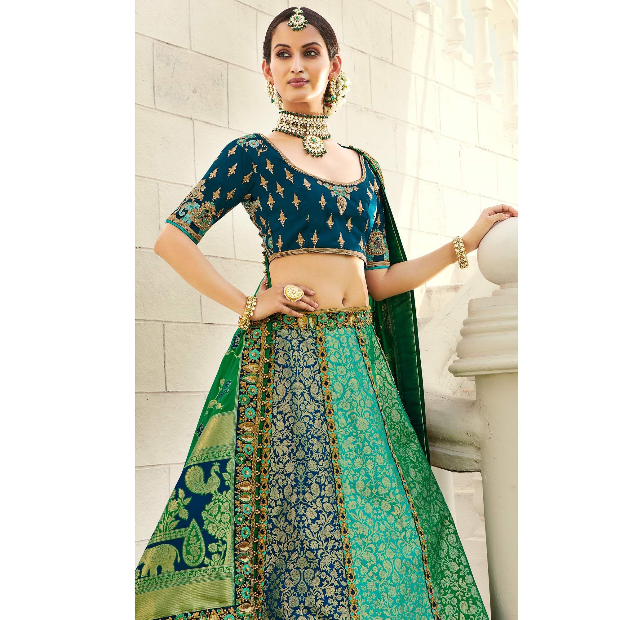 Turquoise Wedding Wear Heavy Embroidered Banarasi Silk Lehenga Choli - Peachmode