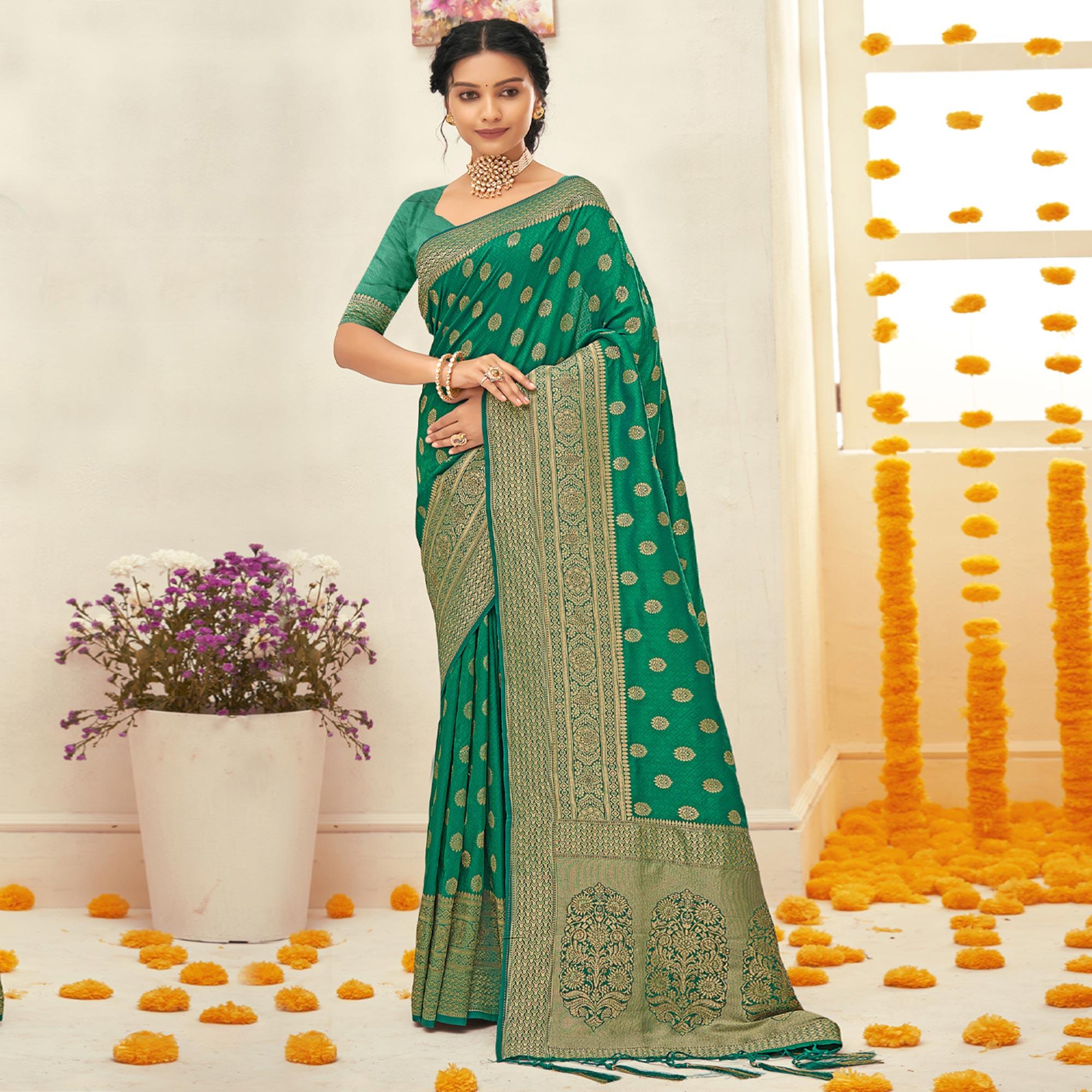 Turquoise Woven Art Silk Saree With Tassels - Peachmode