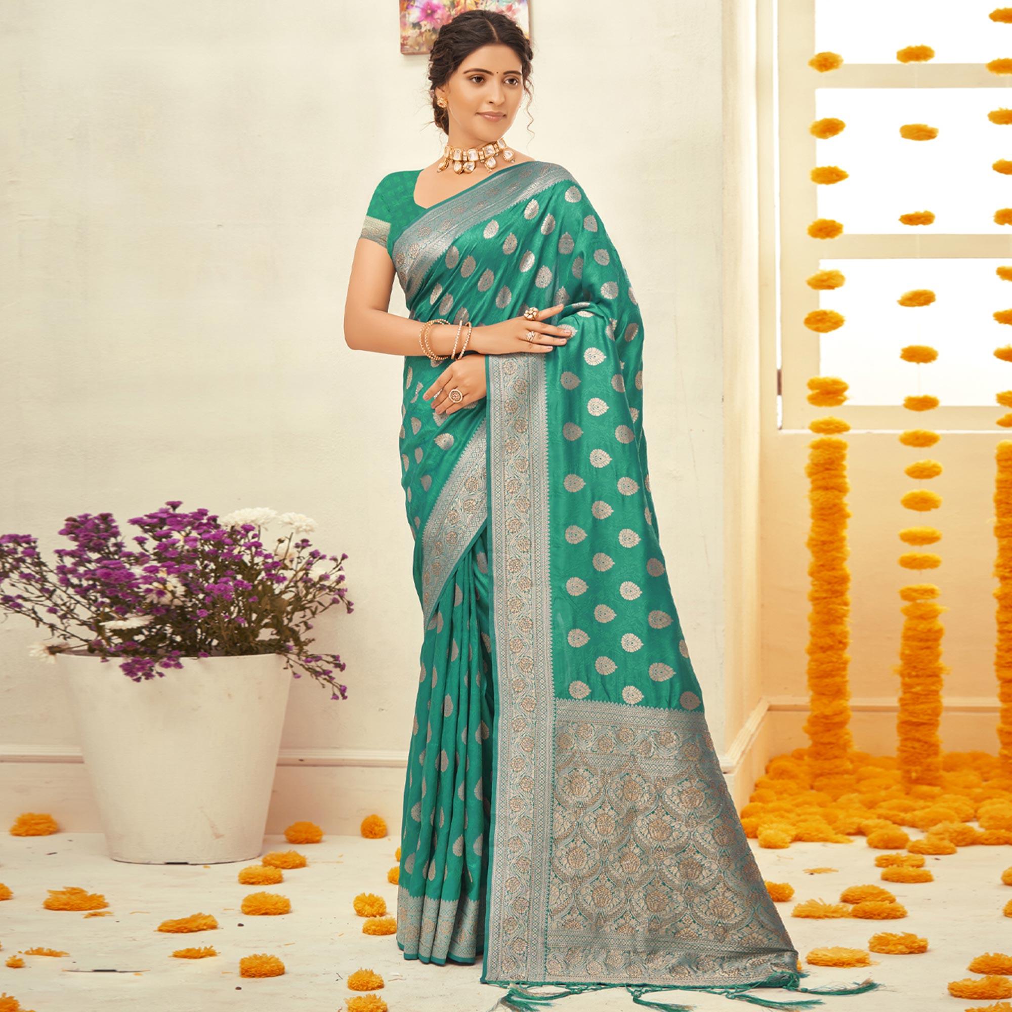 Turquoise Woven Art Silk Saree With Tassels - Peachmode