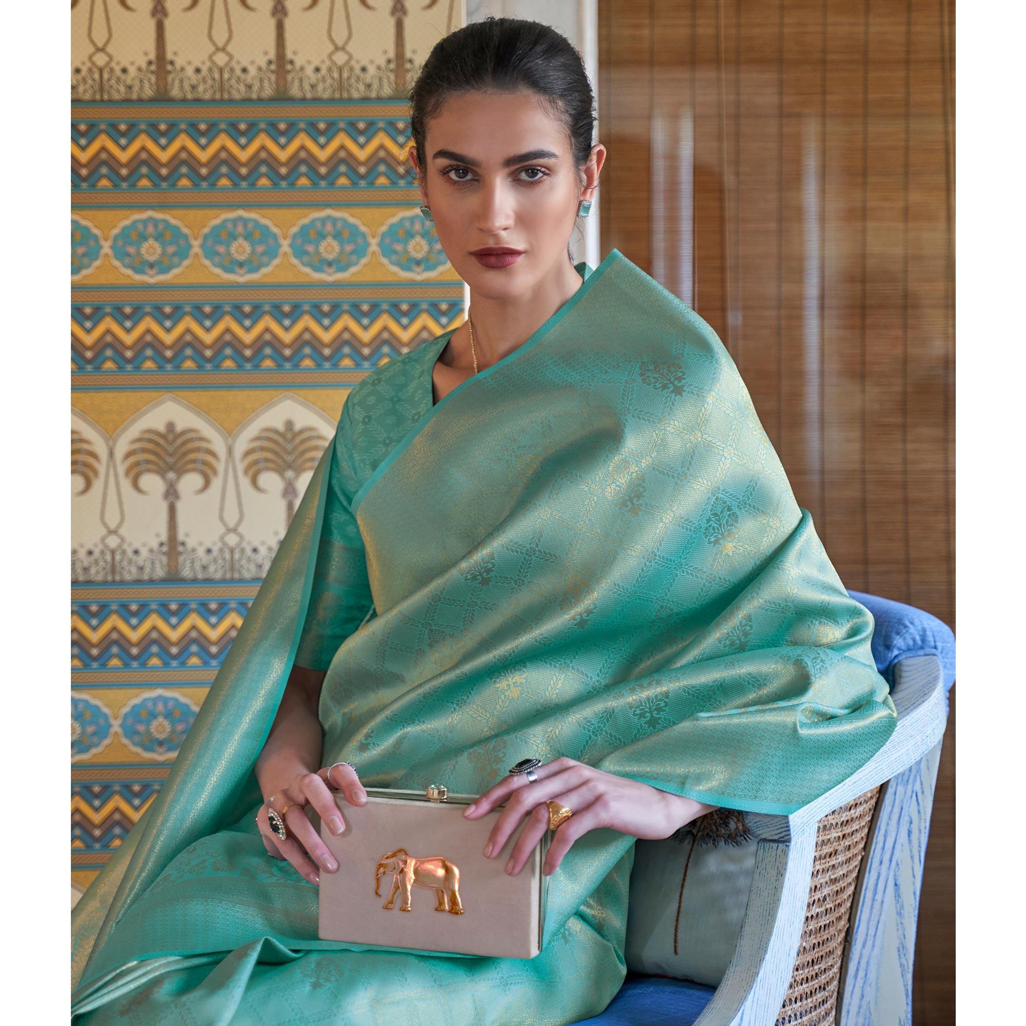 Turquoise Woven Art Silk Saree With Tassels - Peachmode