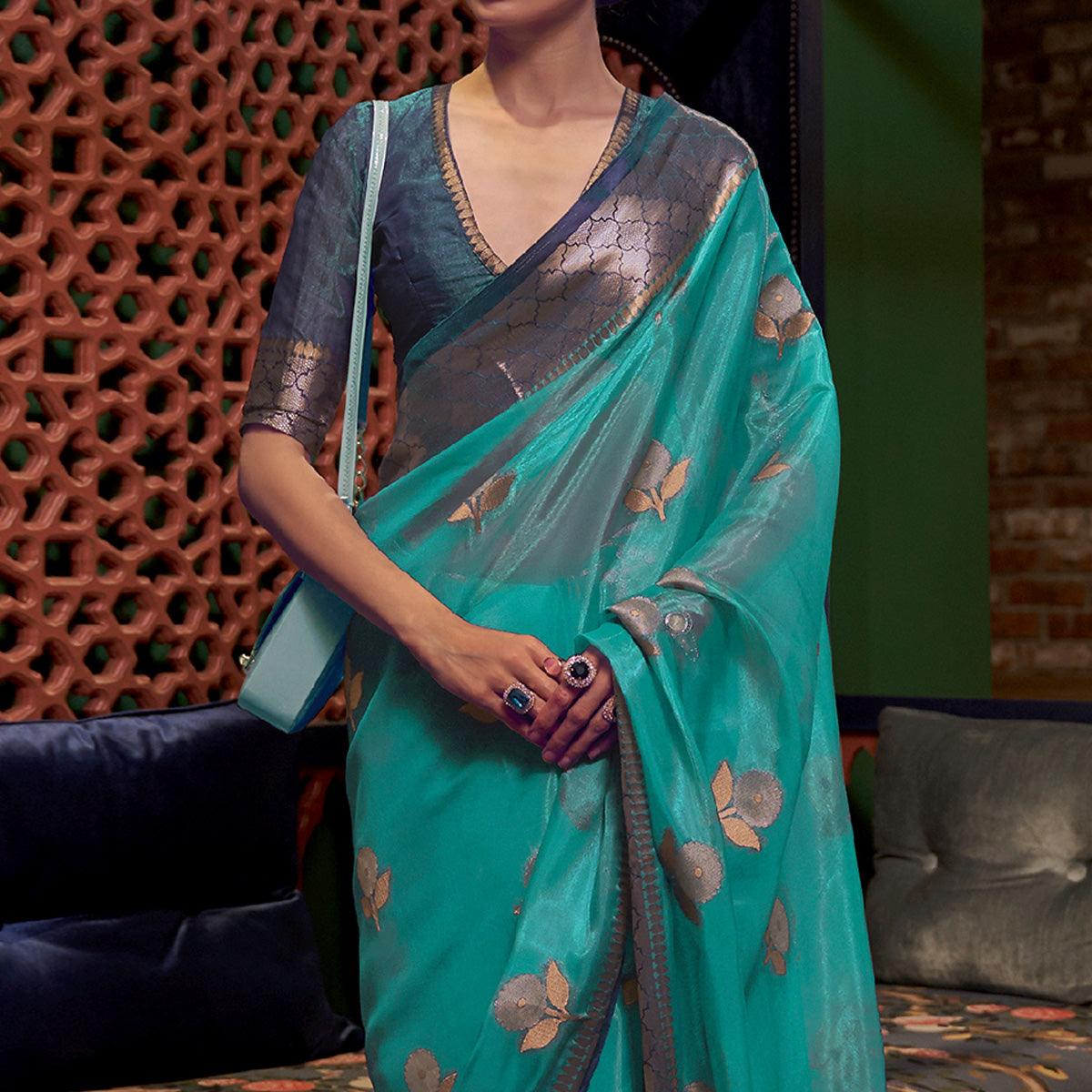Turquoise Woven Organza Saree With Tassels - Peachmode