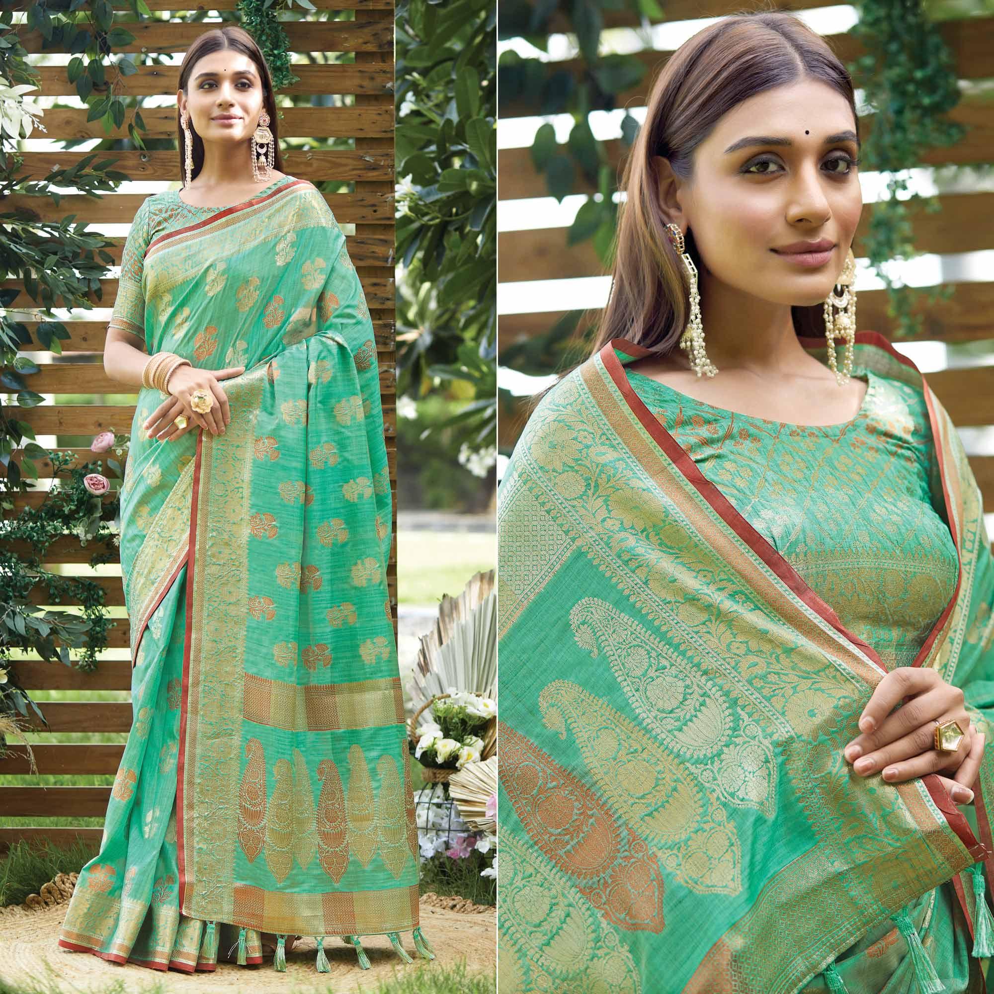 Turquoise Woven Raw Silk Saree With Tassels - Peachmode