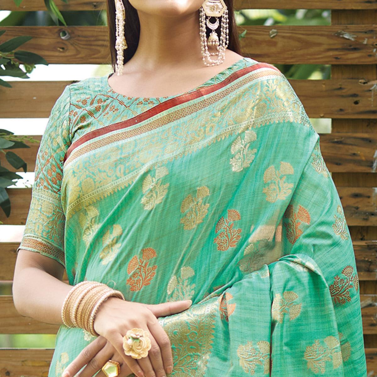 Turquoise Woven Raw Silk Saree With Tassels - Peachmode