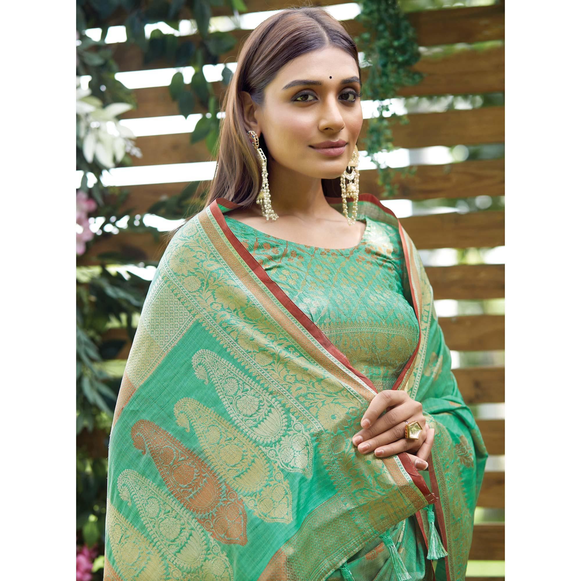 Turquoise Woven Raw Silk Saree With Tassels - Peachmode