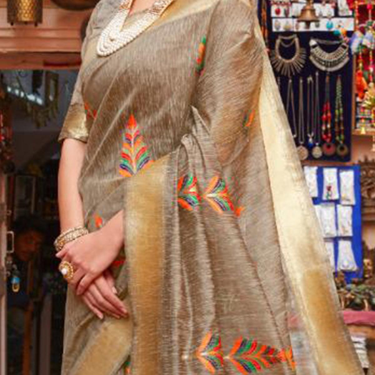Unique Beige Colored Partywear Printed Linen Saree - Peachmode