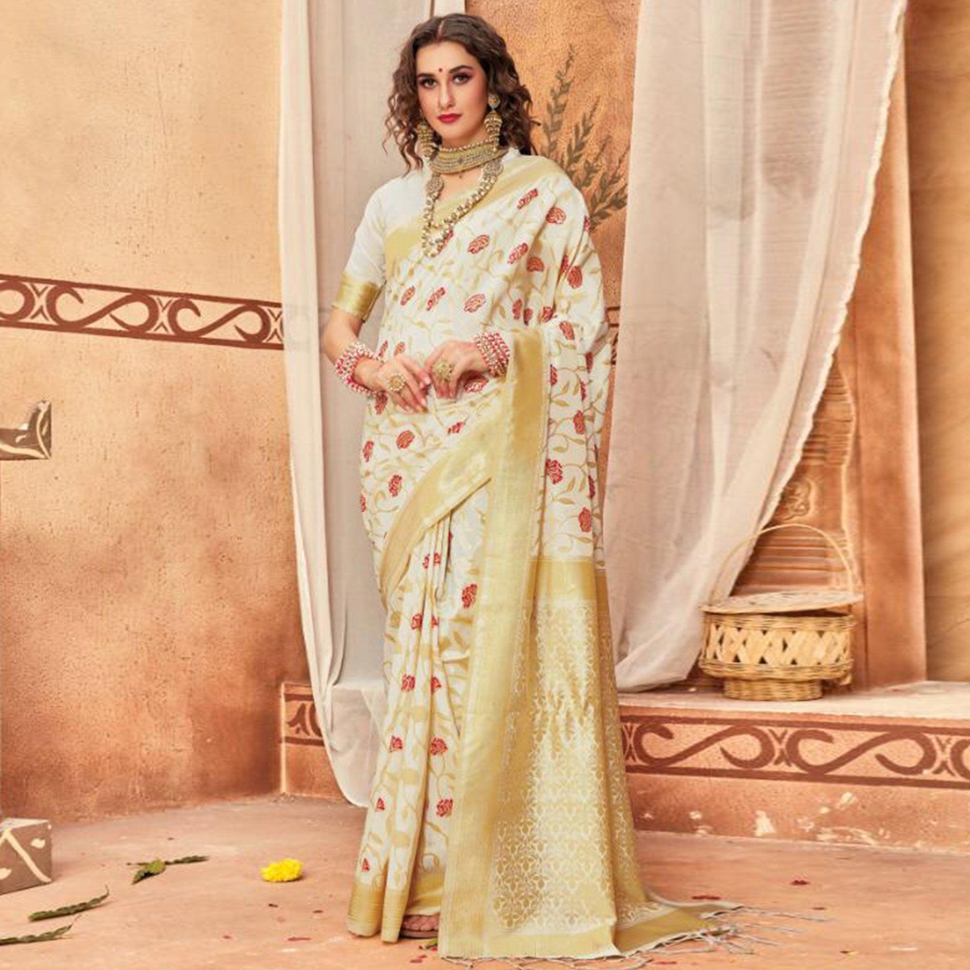 Unique Cream Colored Festive Wear Woven Silk Blend Saree With Tassels - Peachmode