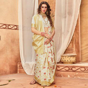 Unique Cream Colored Festive Wear Woven Silk Blend Saree With Tassels - Peachmode