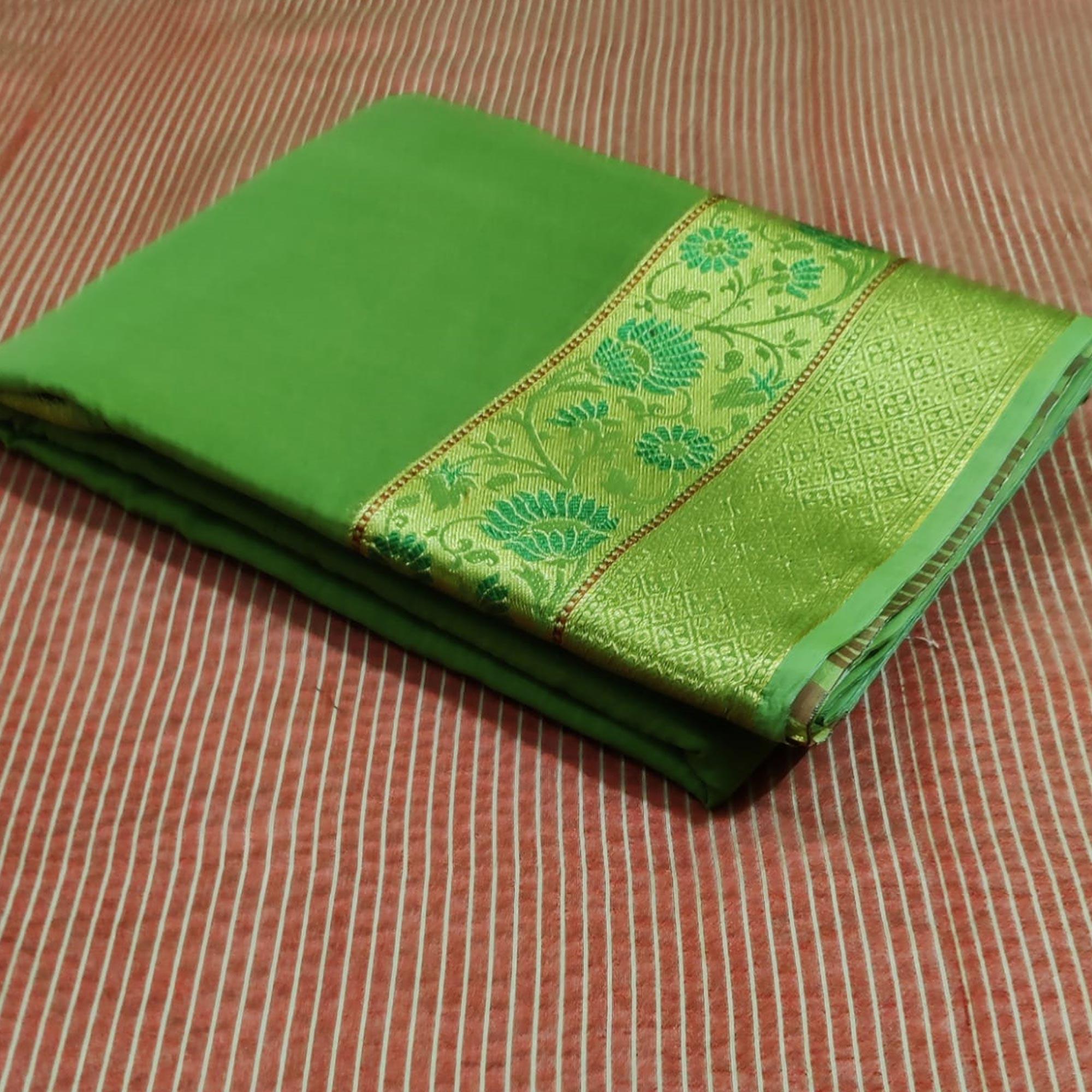 Unique Green Colored Festive Wear Woven Cotton Saree - Peachmode