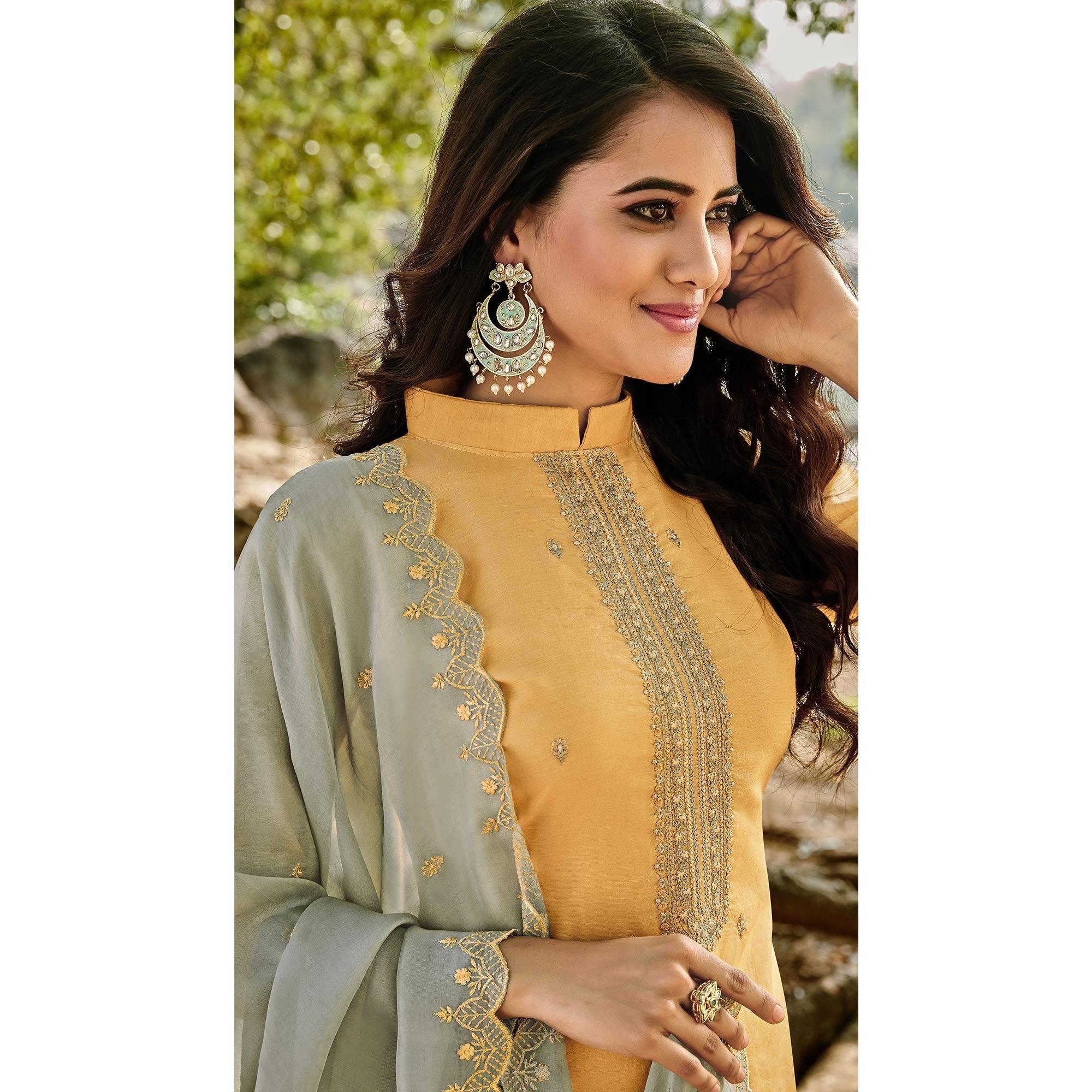 Unique Light Yellow Colored Partywear Embroidered Chanderi Suit - Peachmode