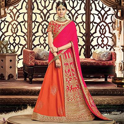 Unique Orange-Pink Colored Designer Embroidered Wedding Wear Tapeta-Raw Silk Lehenga Saree - Peachmode