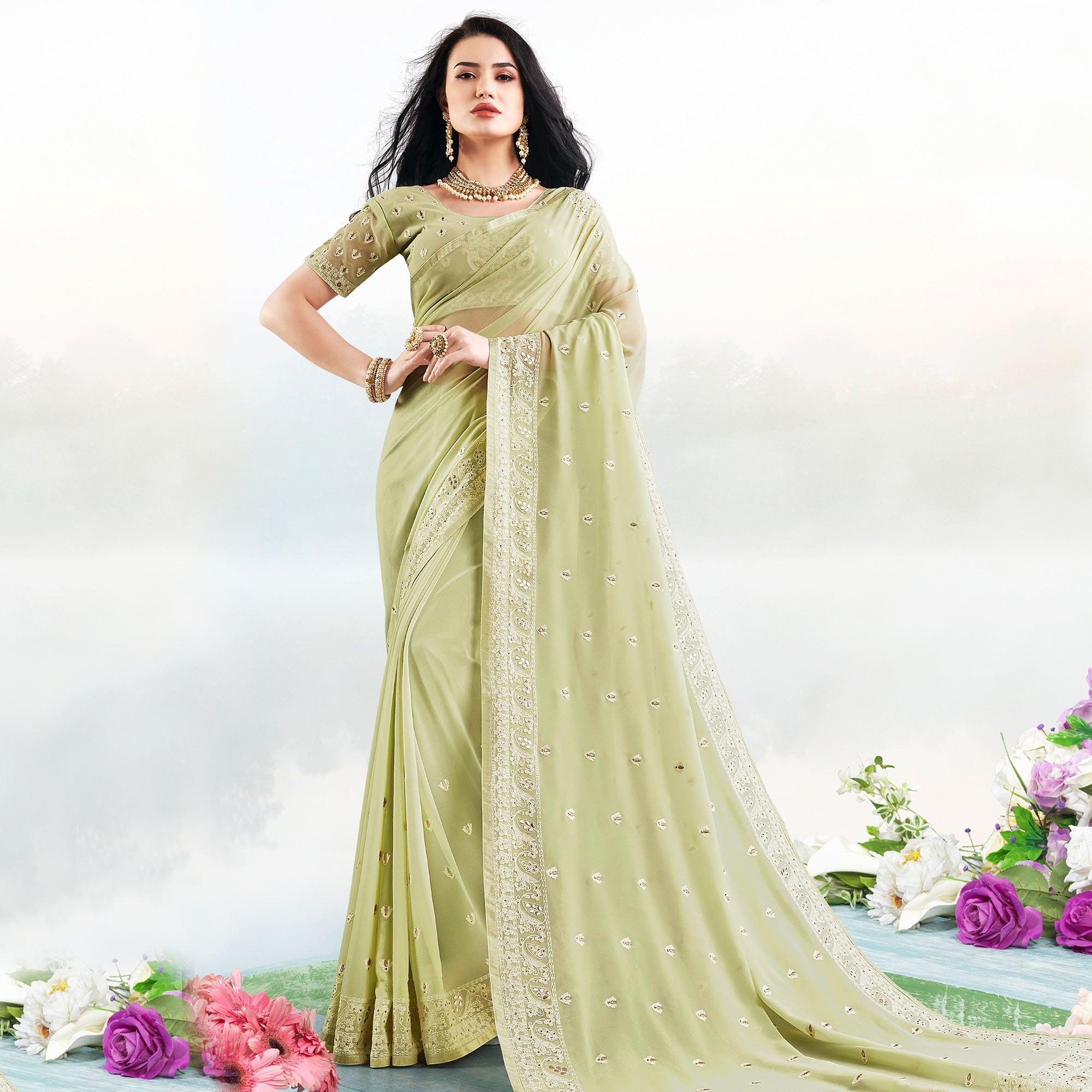 Unique Pastel Green Colored Partywear Embroidered Georgette Saree - Peachmode