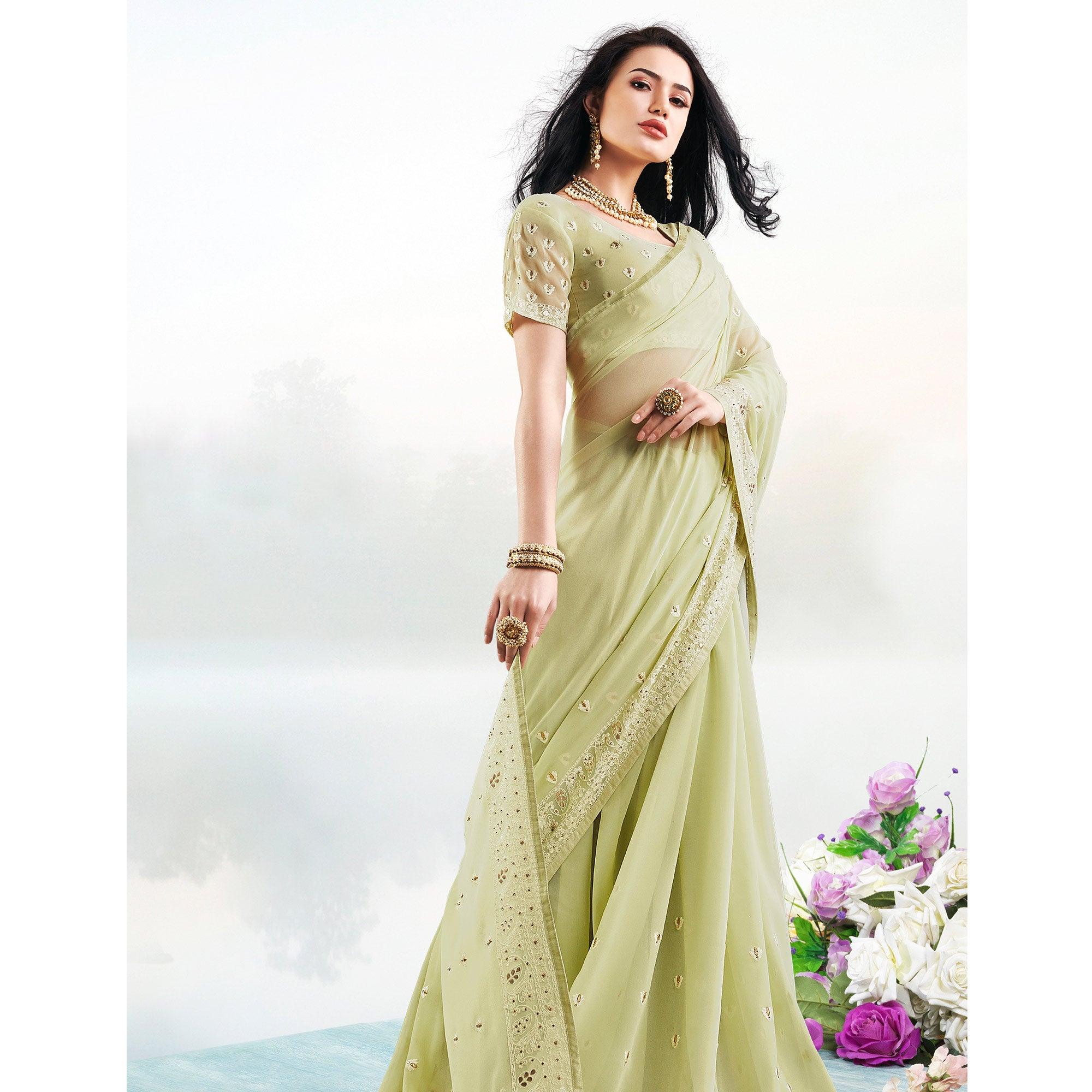 Unique Pastel Green Colored Partywear Embroidered Georgette Saree - Peachmode