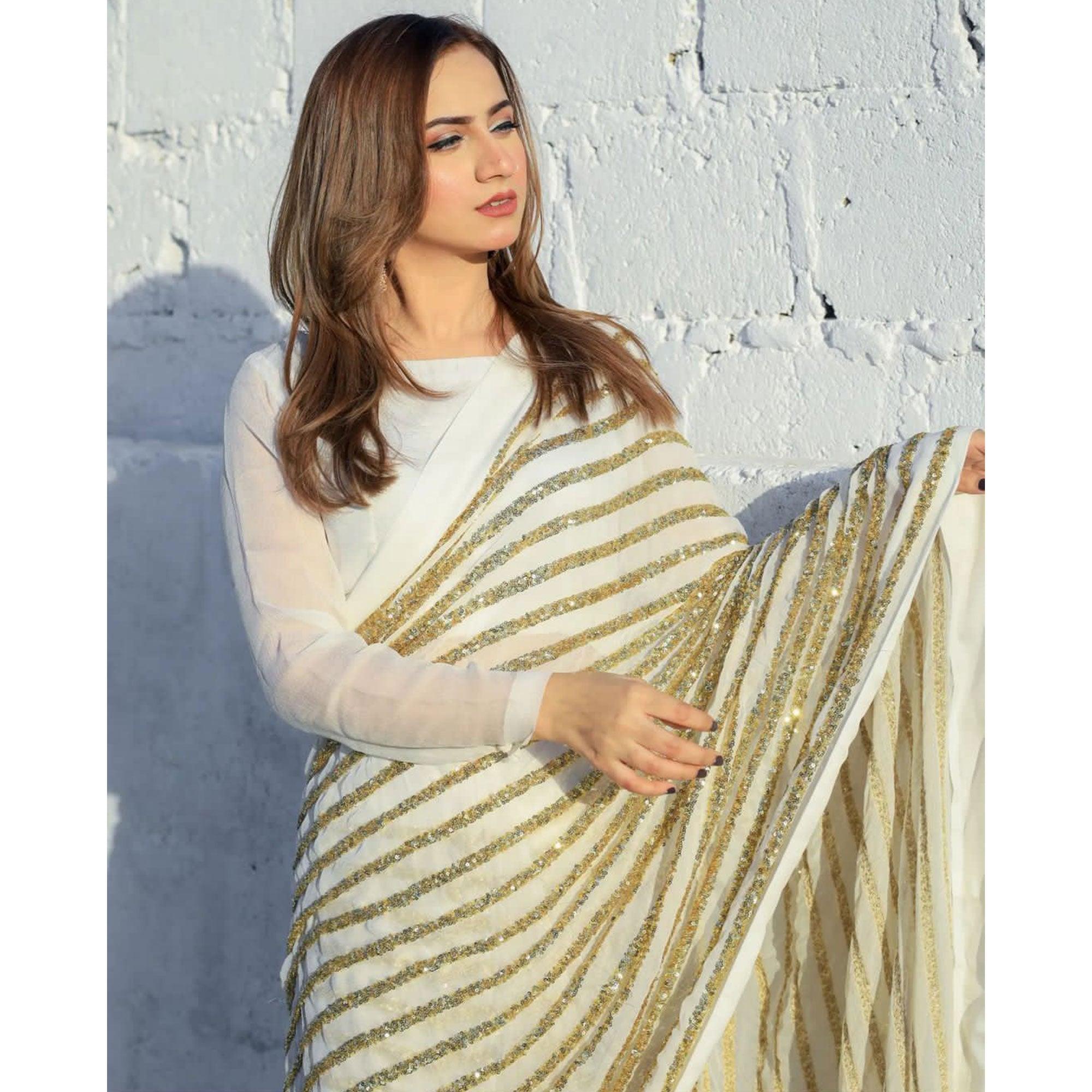 White Partywear Embellished With Sequins Georgette Saree - Peachmode
