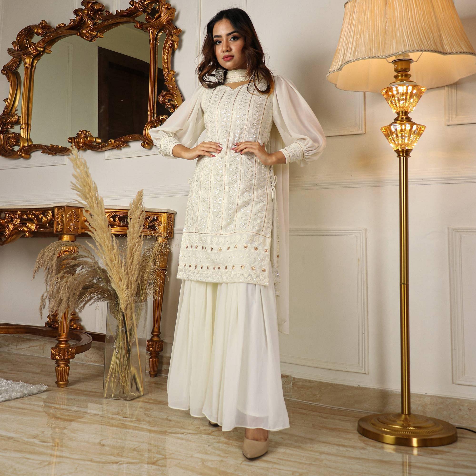 White Partywear Sequence Embroidered Georgette Sharara Suit - Peachmode