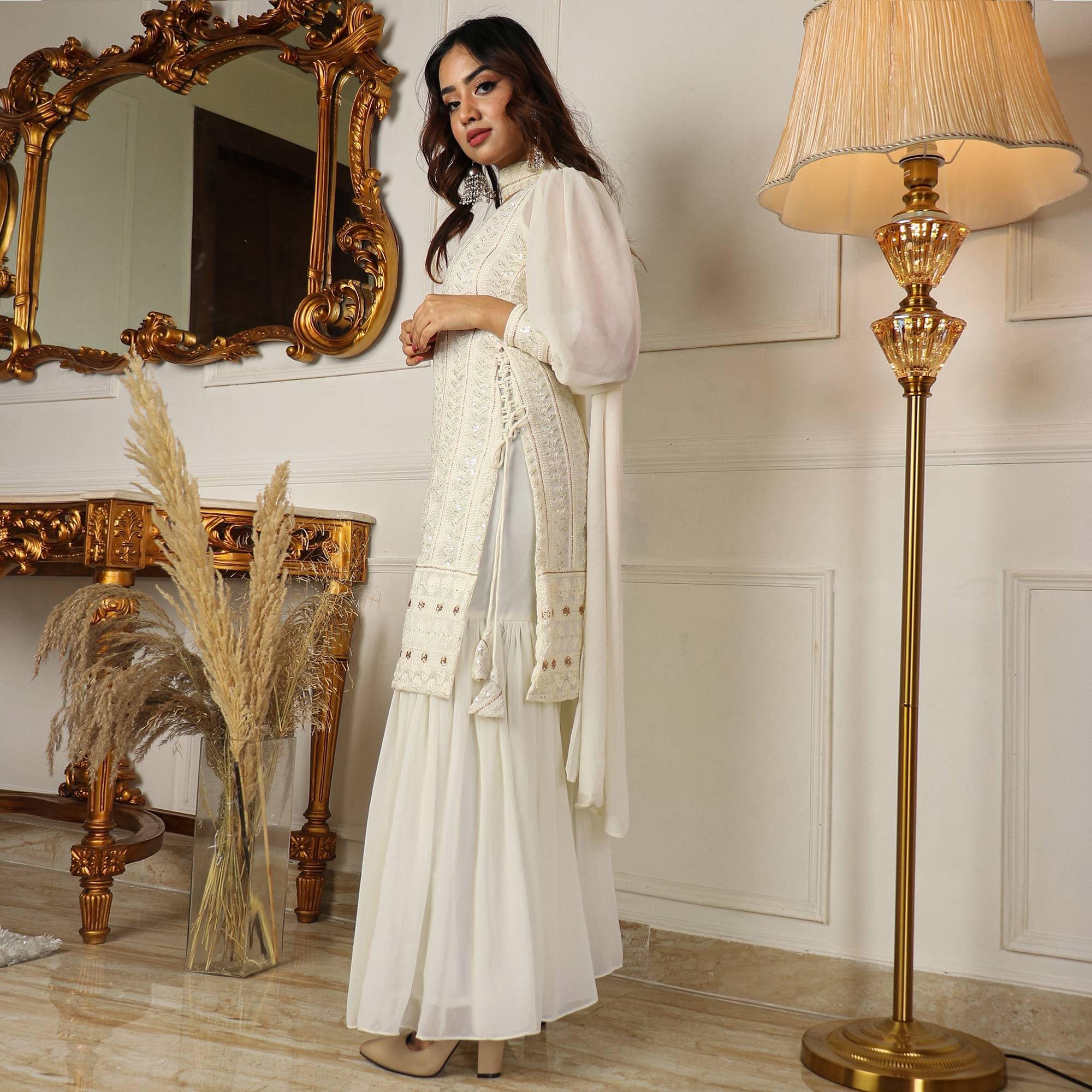 White Partywear Sequence Embroidered Georgette Sharara Suit - Peachmode